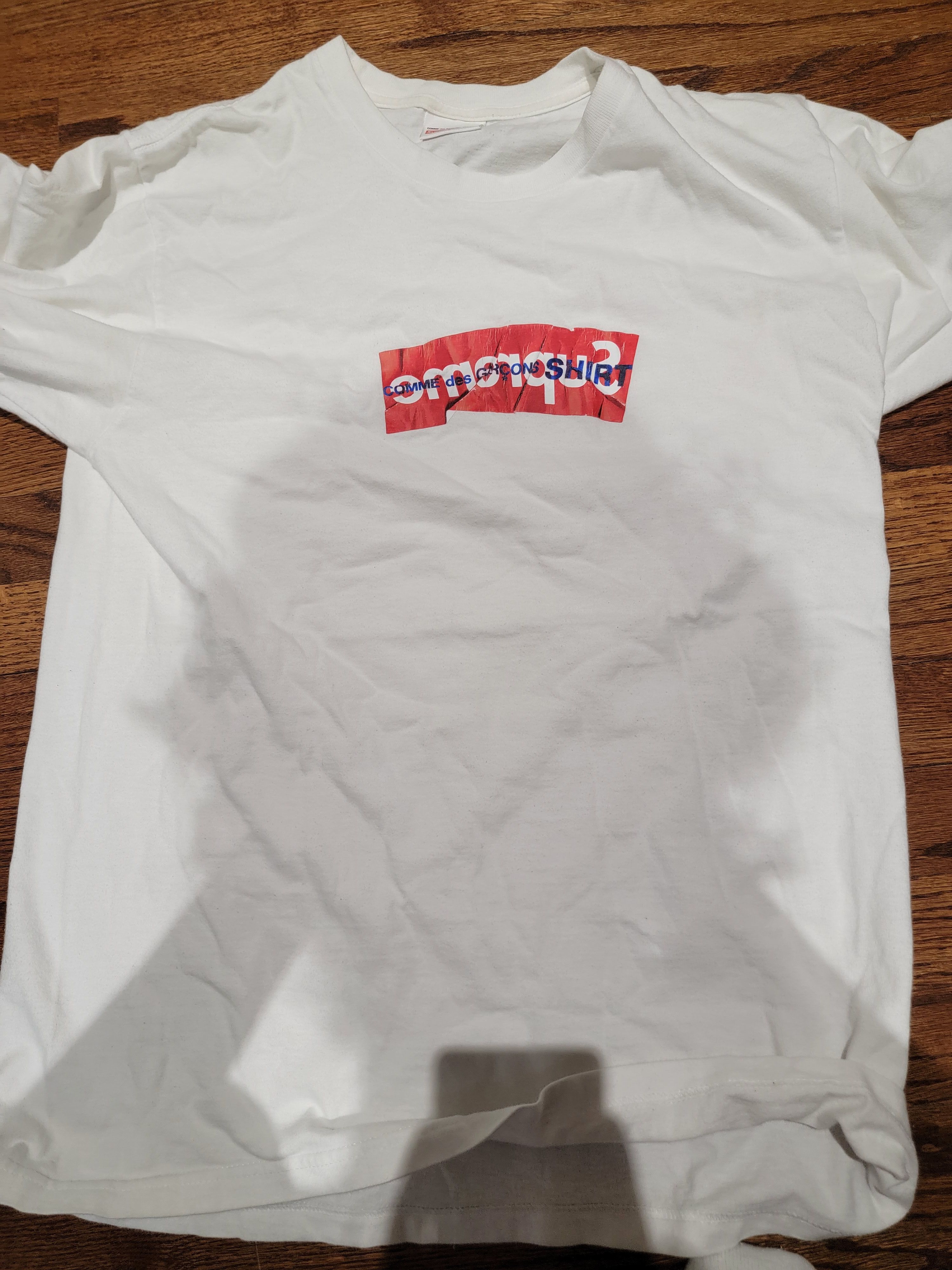 comme de garcon nike supreme