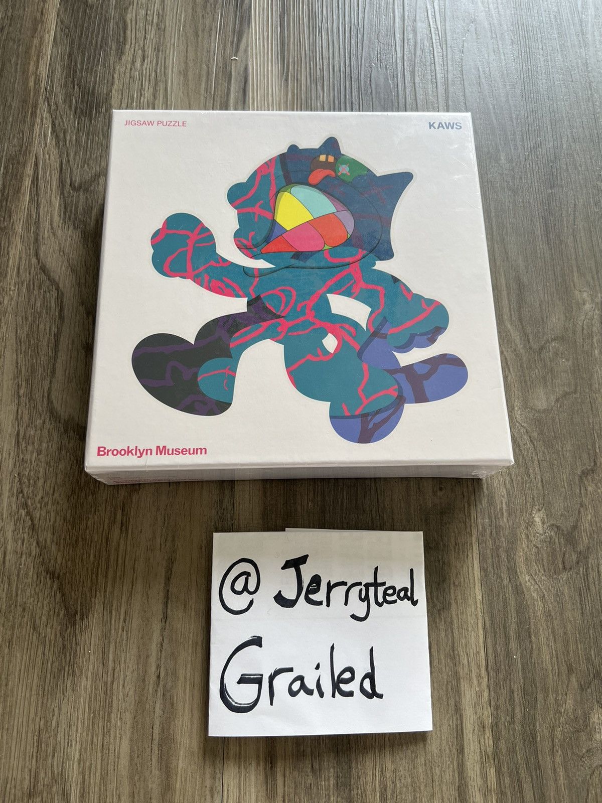 KAWS Brooklyn Museum Isolation Tower Puzzle + Cadre Plexiglas - Quelle Fête !