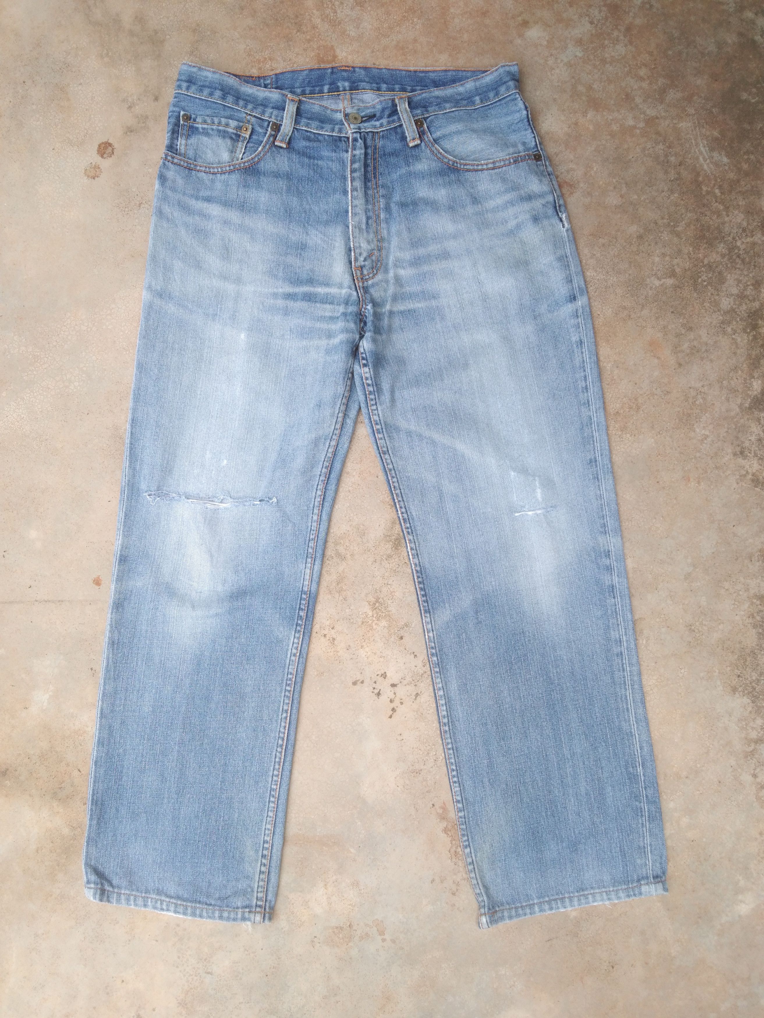 image of Vintage Levi's Jeans 702 Light Wash Distressed Denim 34X28.5 in Blue, Men's