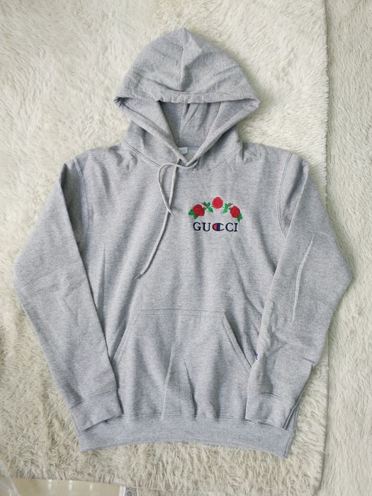 Champion rose hoodie sales gucci