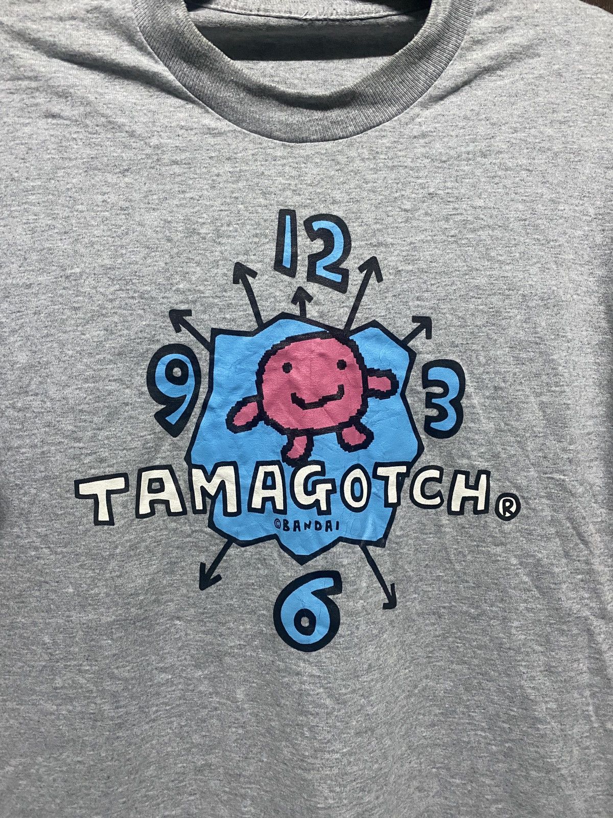 Cartoon Network × Vintage HOLLY GRAIL VINTAGE 90s BANDAI TAMAGOTCH robot japanes games Size US L / EU 52-54 / 3 - 2 Thumbnail
