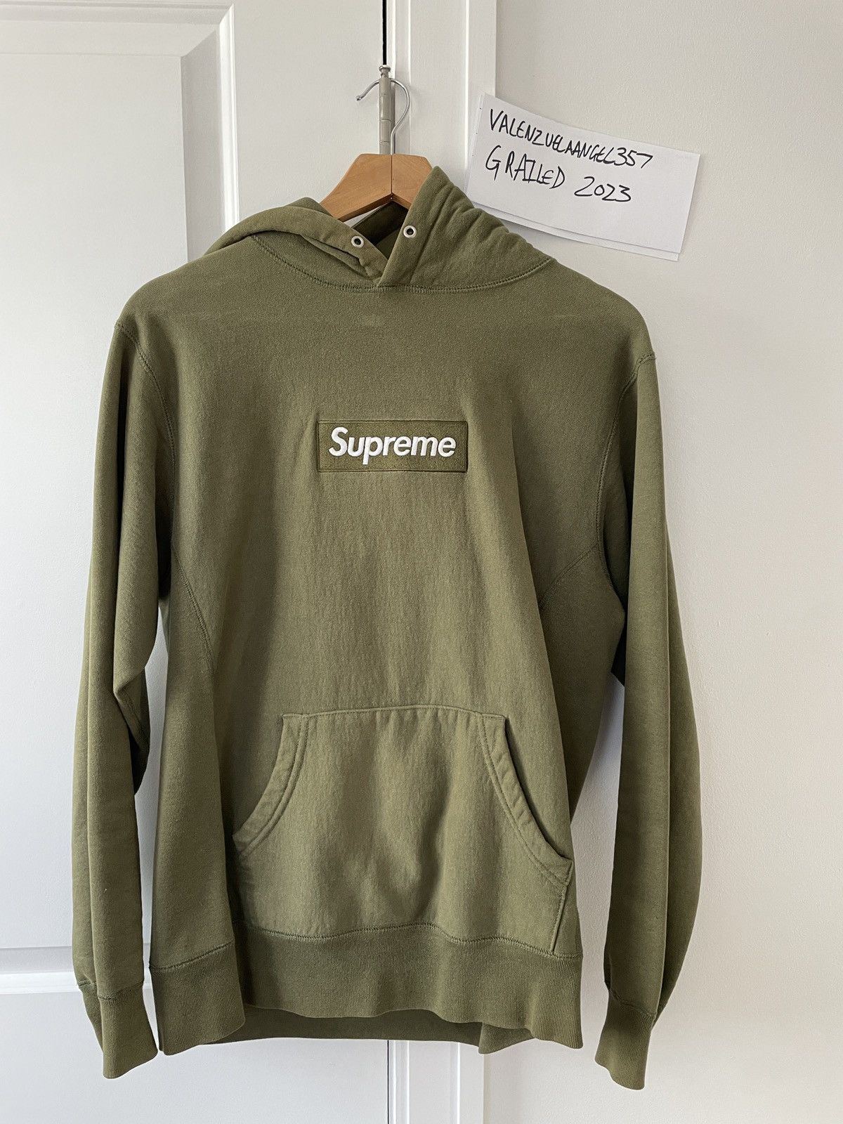 Olive green outlet box logo