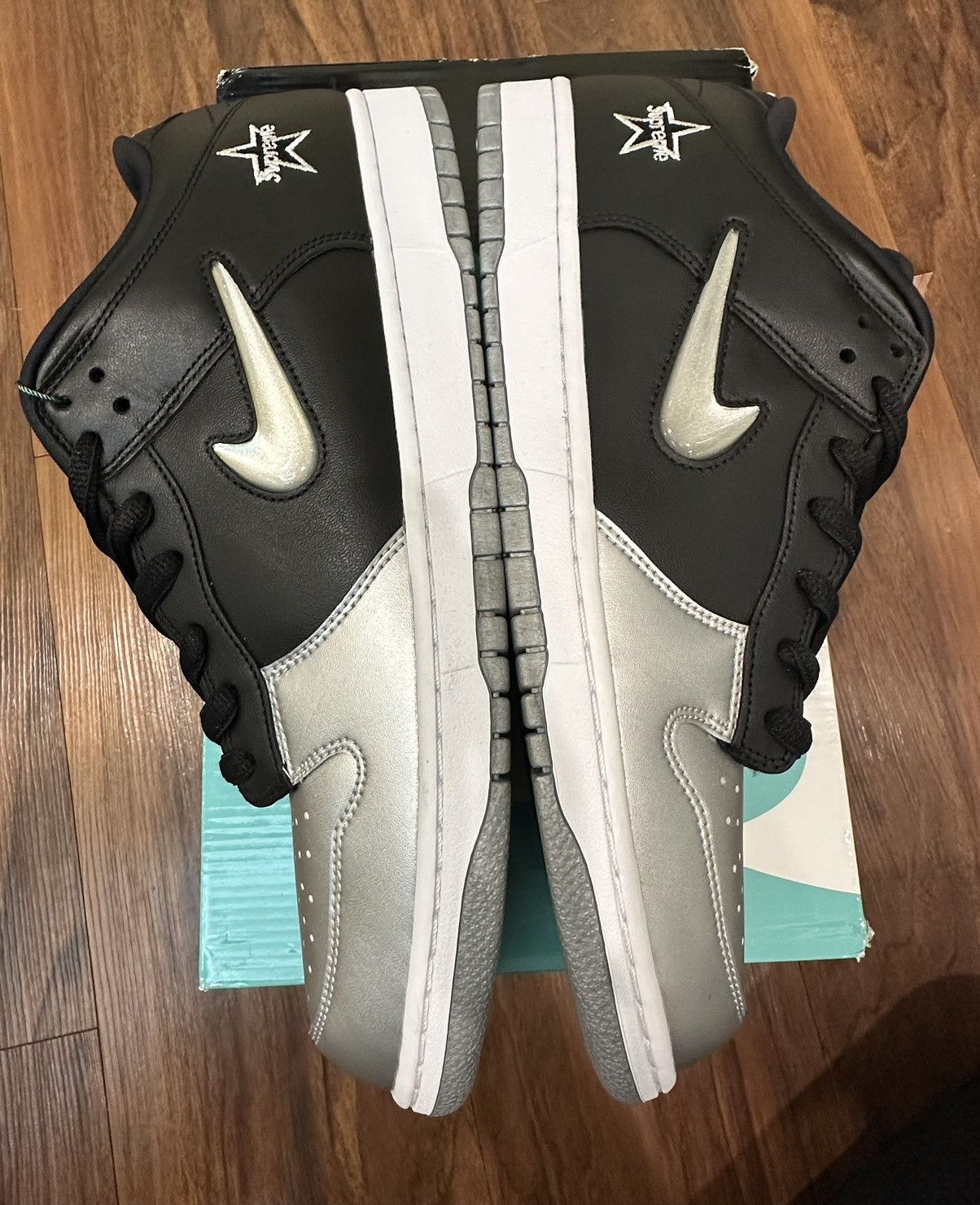 nike sb dunk low supreme jewel swoosh silver