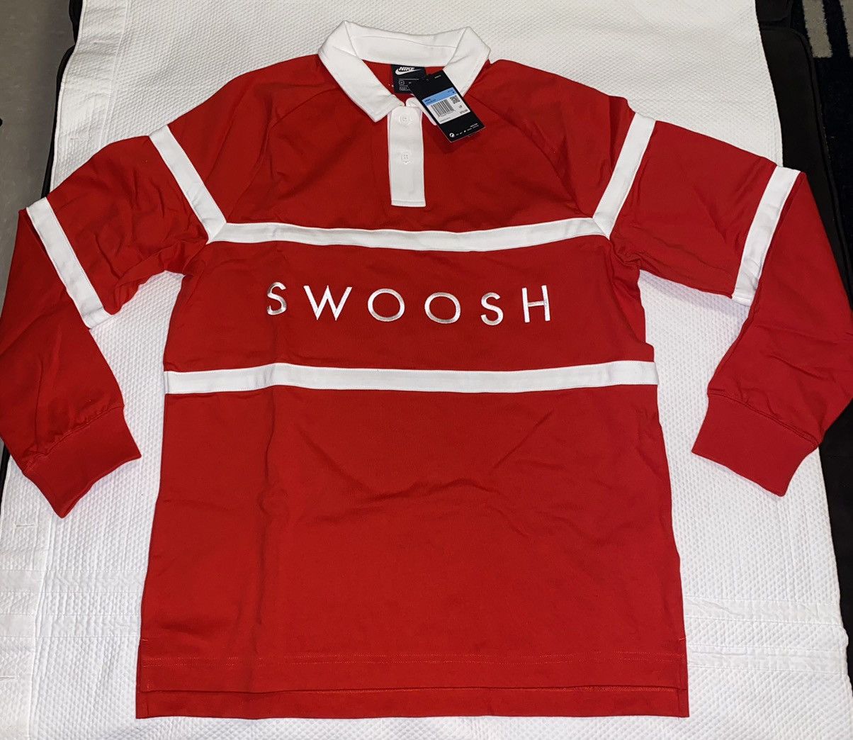 swoosh rugby shirt