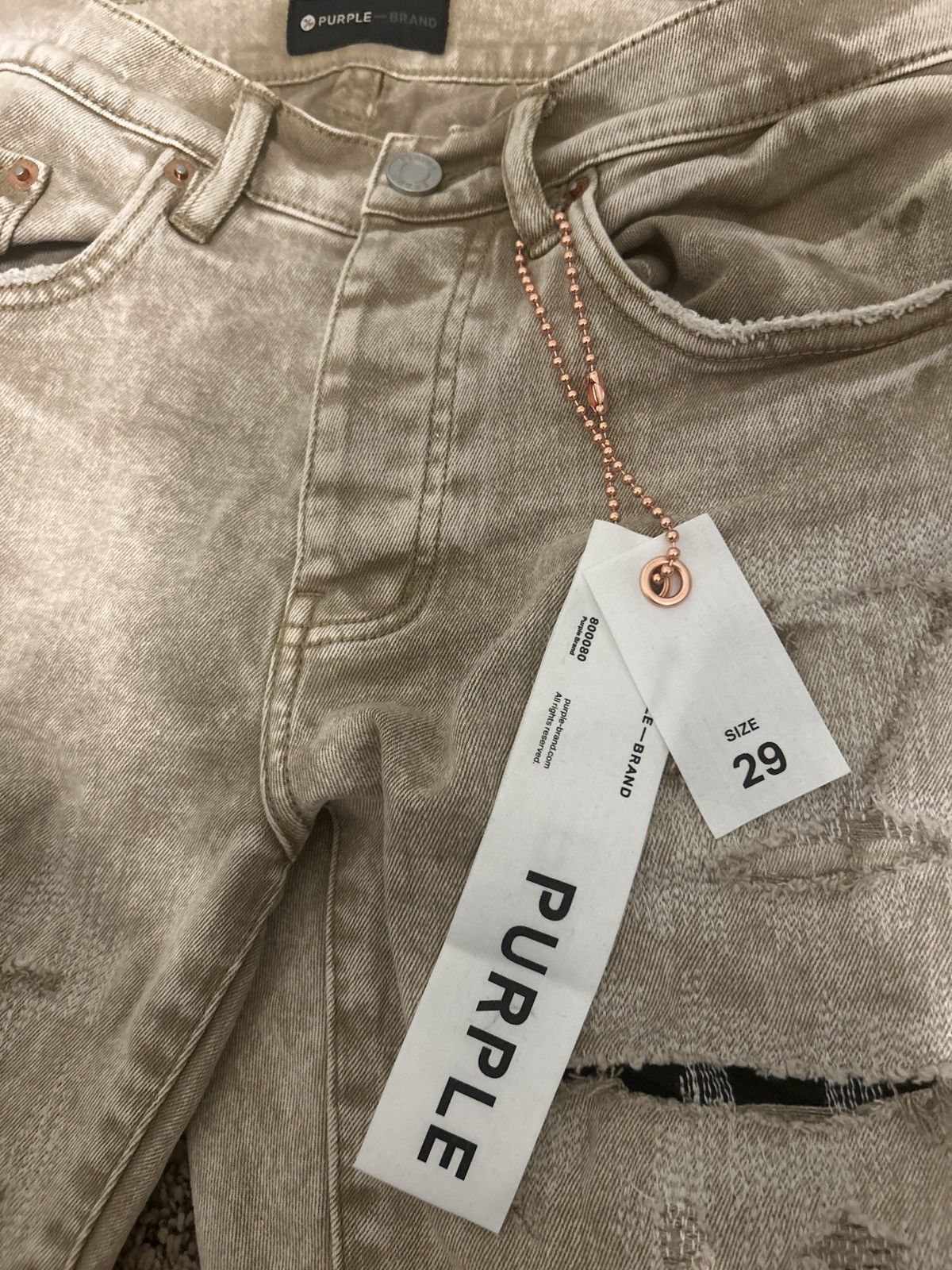 Beige repair Purple brand jeans