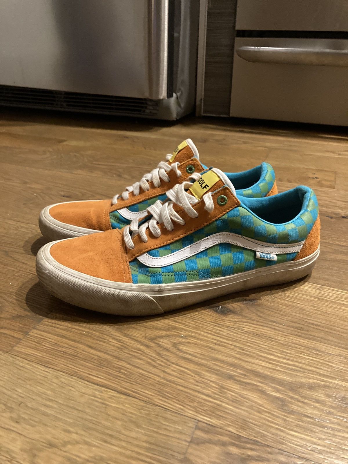 Blue shops and orange checkered vans