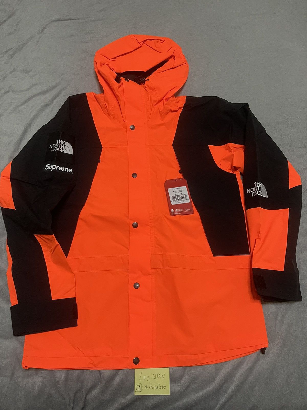 North face supreme orange best sale