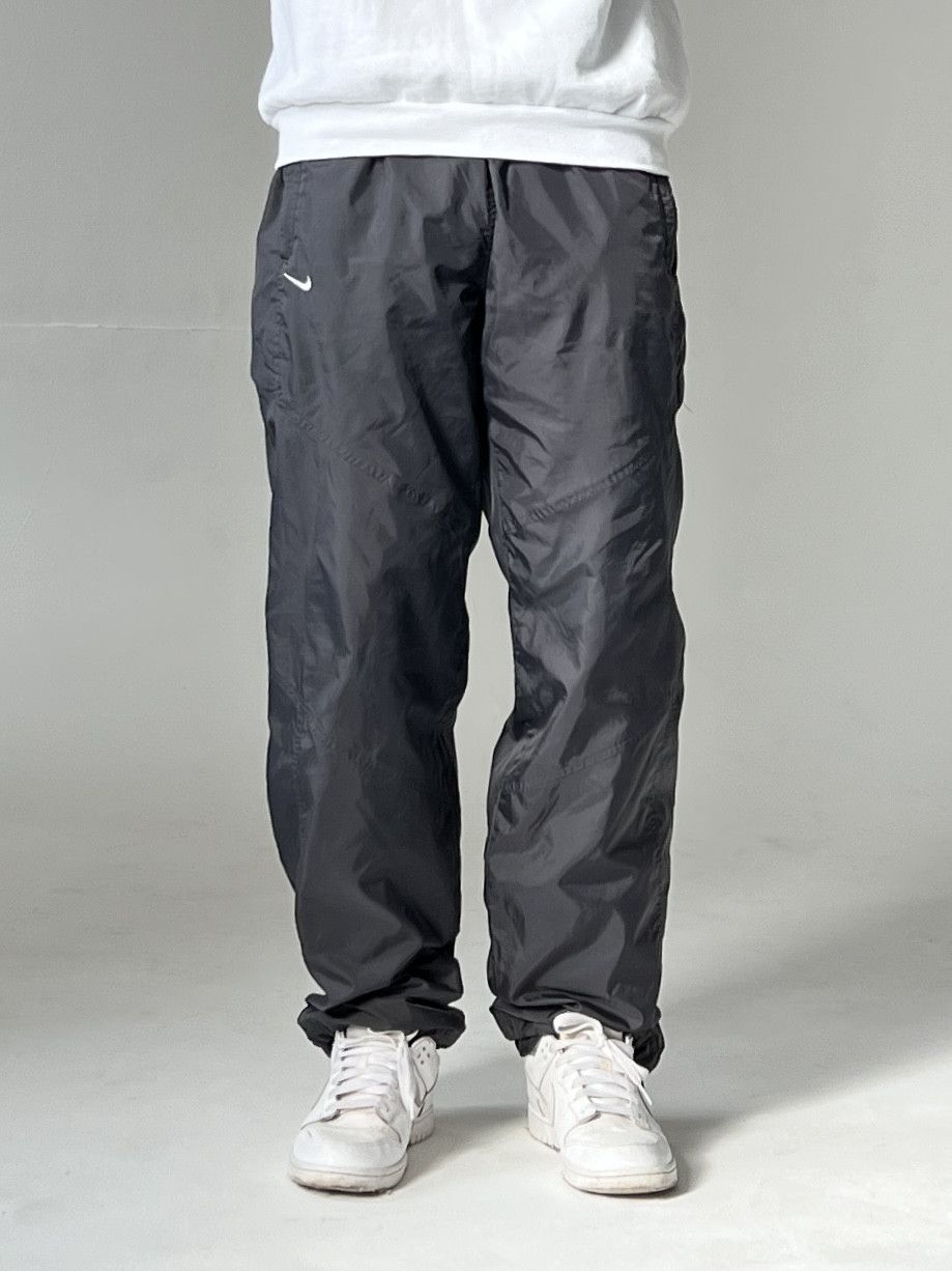 Nike nylon track pants hotsell