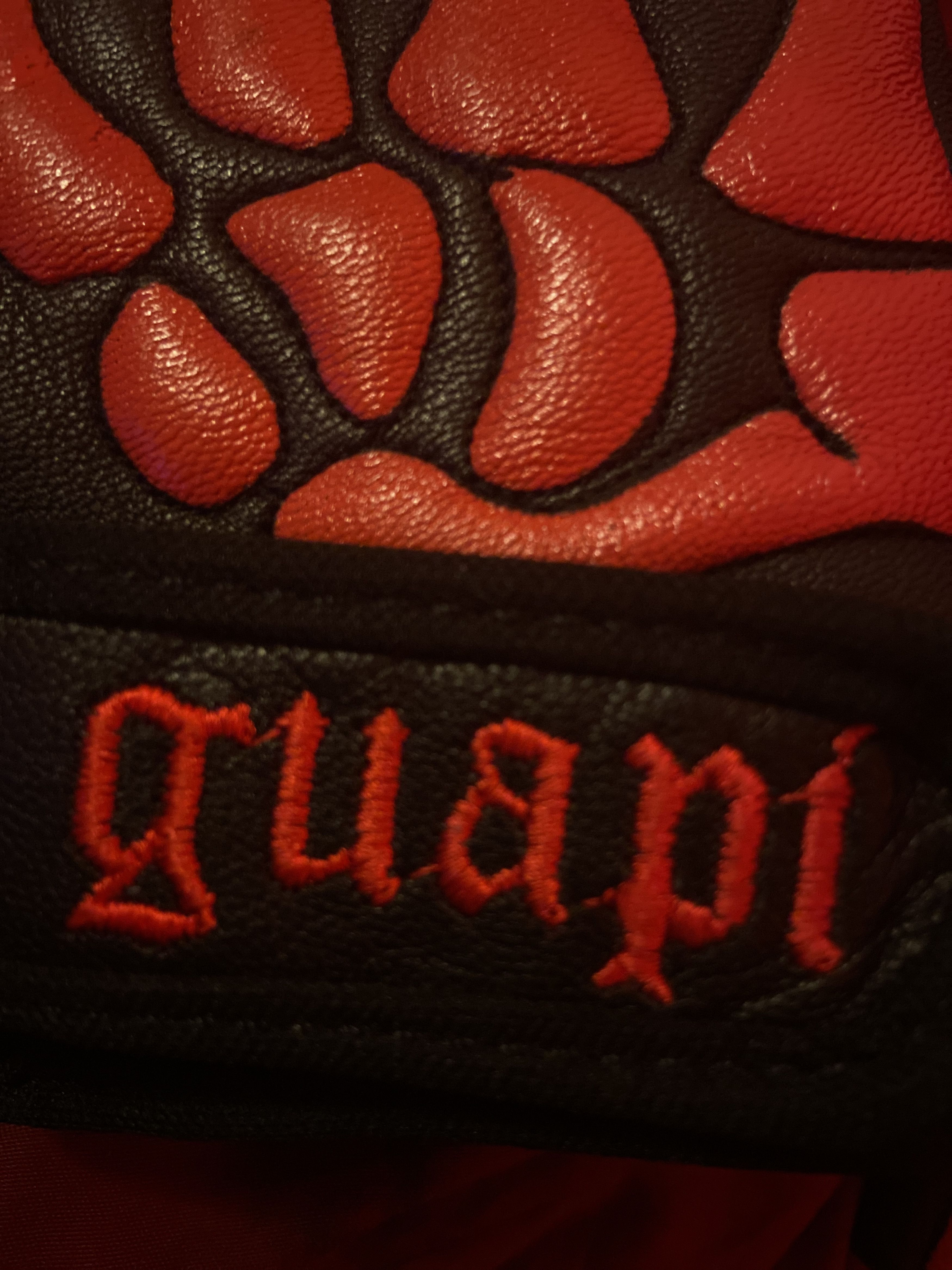 Red and black skeleton guapi gloves