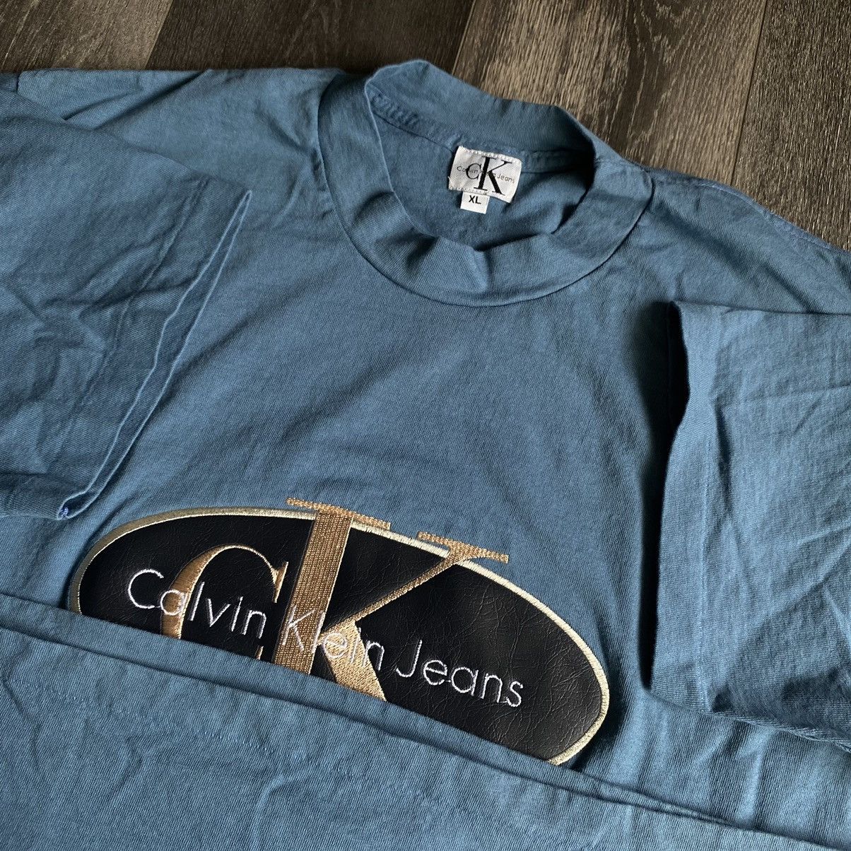 Calvin Klein Vintage 1990s Calvin Klein Jeans Patch Embroidered Logo Tee Size US XL / EU 56 / 4 - 3 Thumbnail