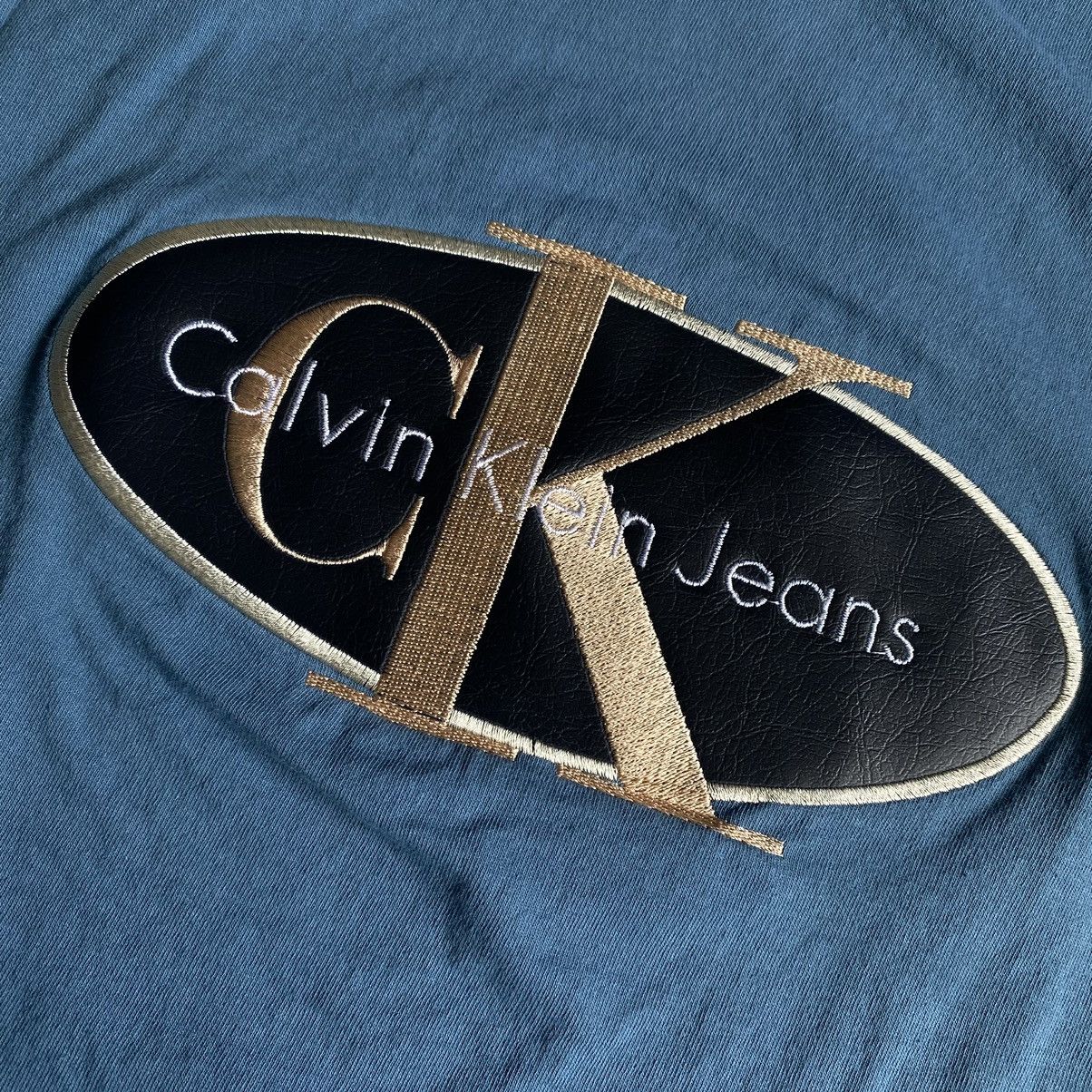 Calvin Klein Vintage 1990s Calvin Klein Jeans Patch Embroidered Logo Tee Size US XL / EU 56 / 4 - 5 Thumbnail