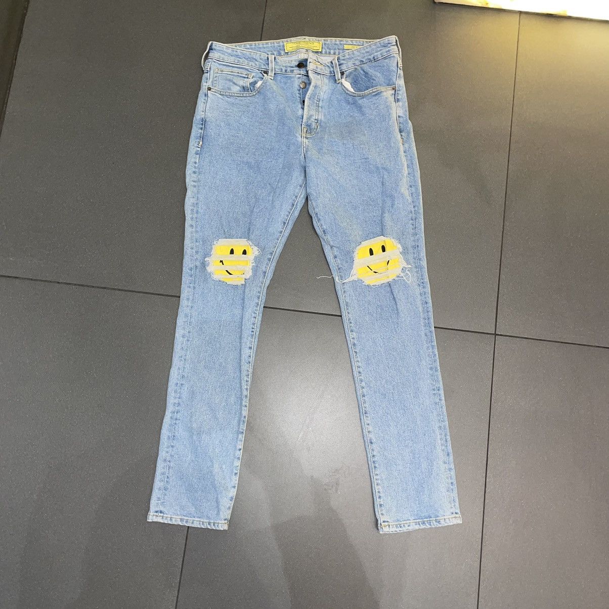 Guess smiley face jeans hotsell