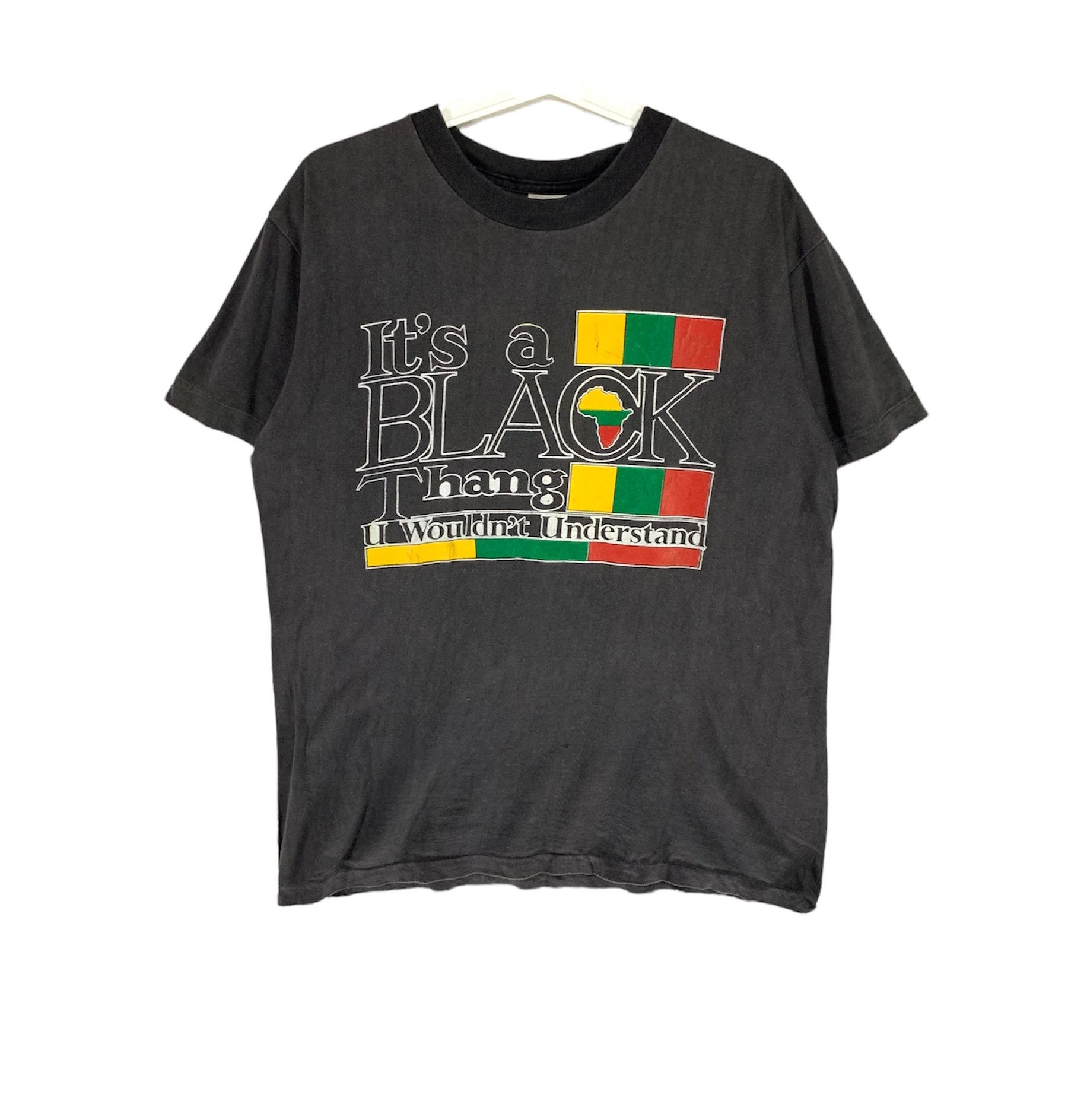 It's a Black Thang spellout vintage 90s wording tshirt
