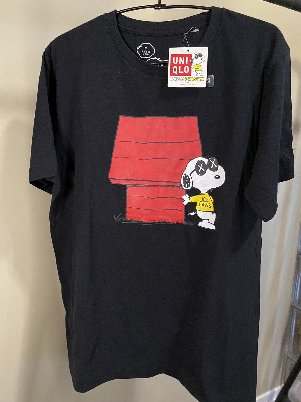 Kaws x Uniqlo Snoopy tee