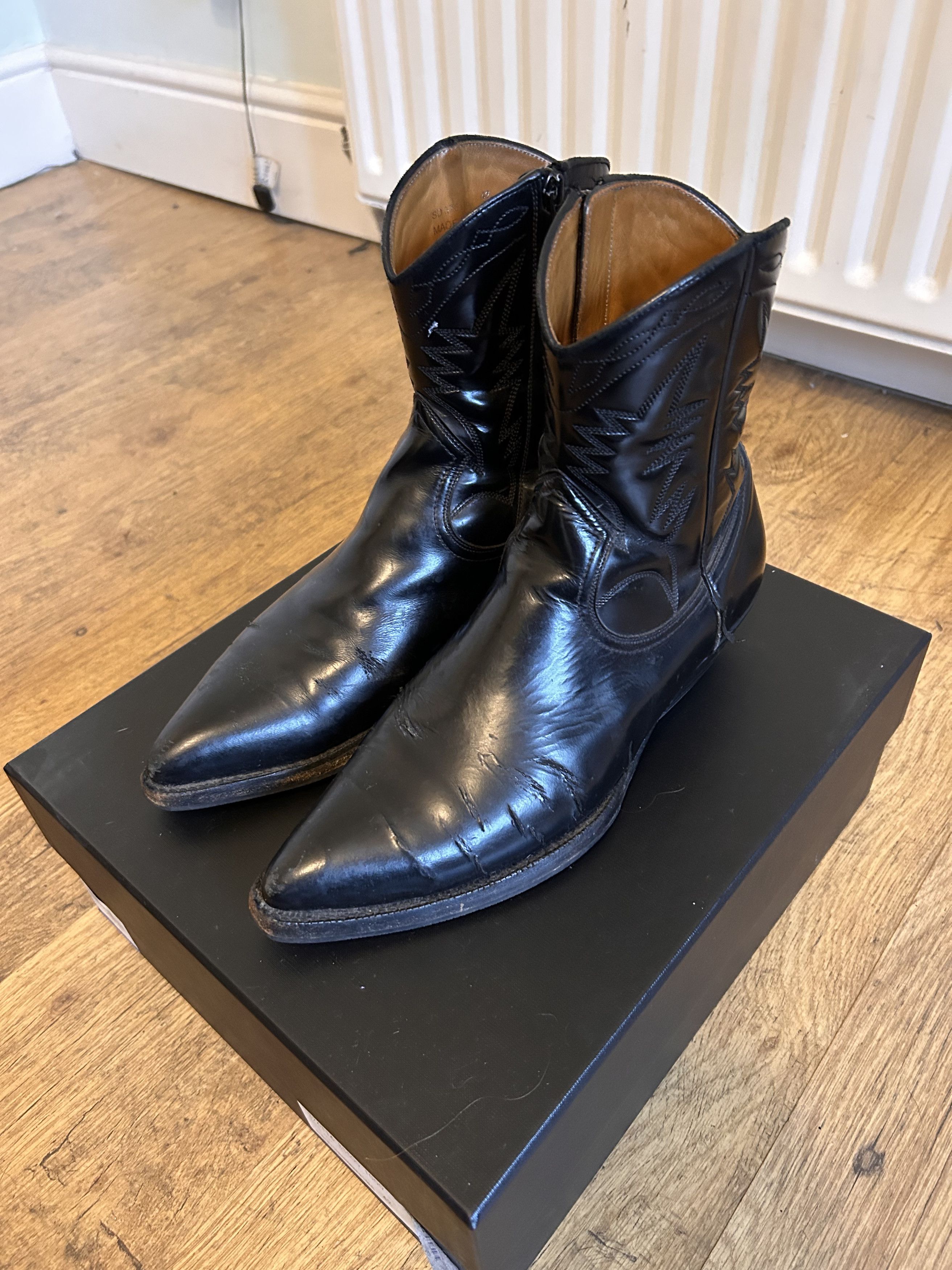 saint laurent paris : boots hedi era Hedi Slimane Debuts Saint