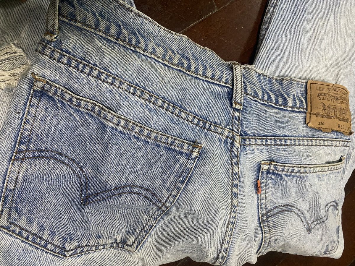 Rare vintage LEVIS JEANS DISTRESSED SUN FADED
