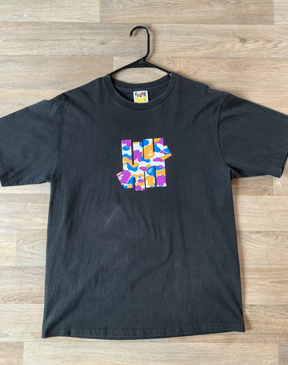 人気話題コラボ！Bape x Undefeated 5 Strikes Tee Black Bape × Undefeated Bape x Undefeated Patch Tee | Grailed