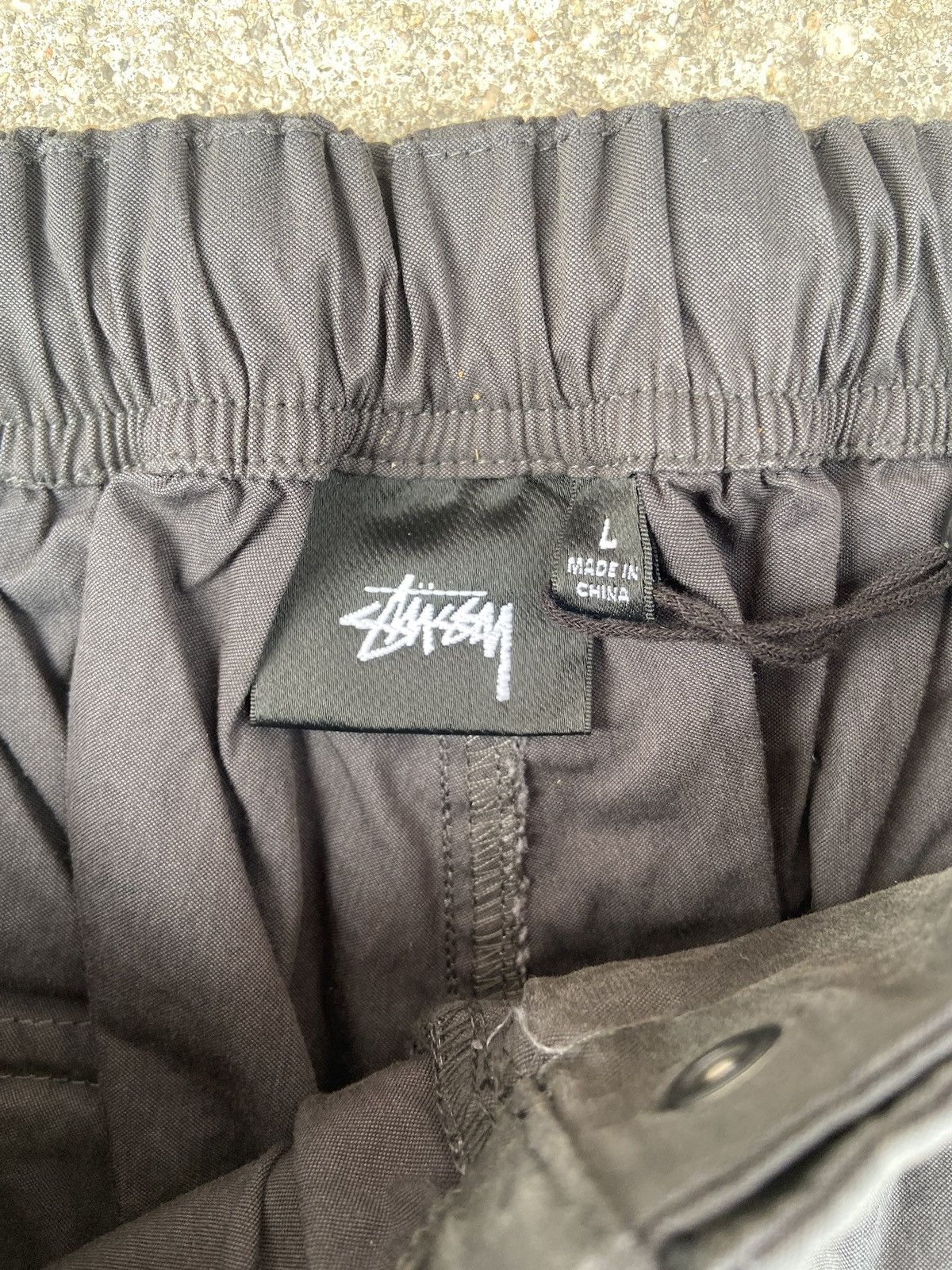 Stussy Stussy NYCO Over Trousers Washed Black | Grailed