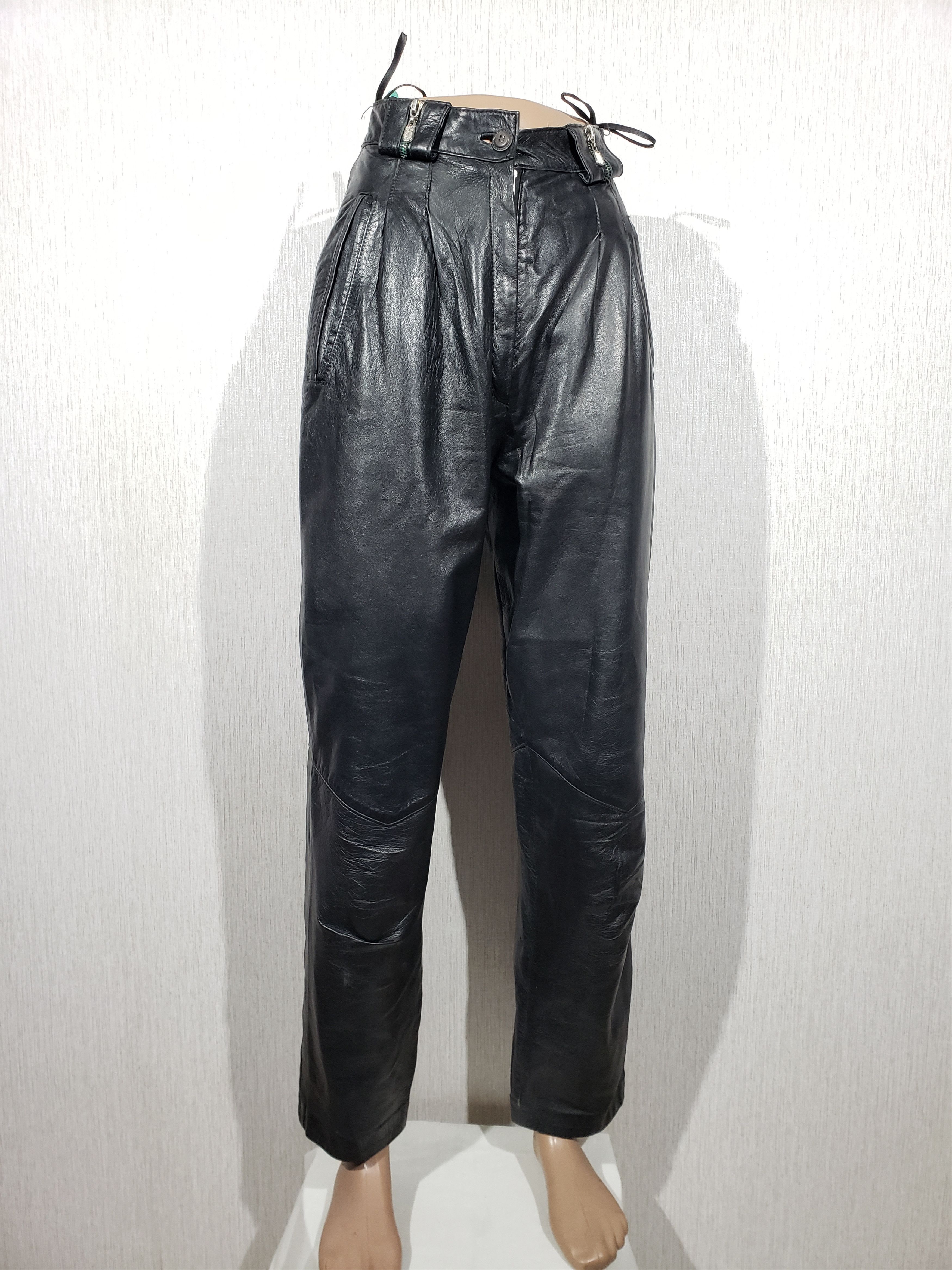 Stylish women's black leather pants