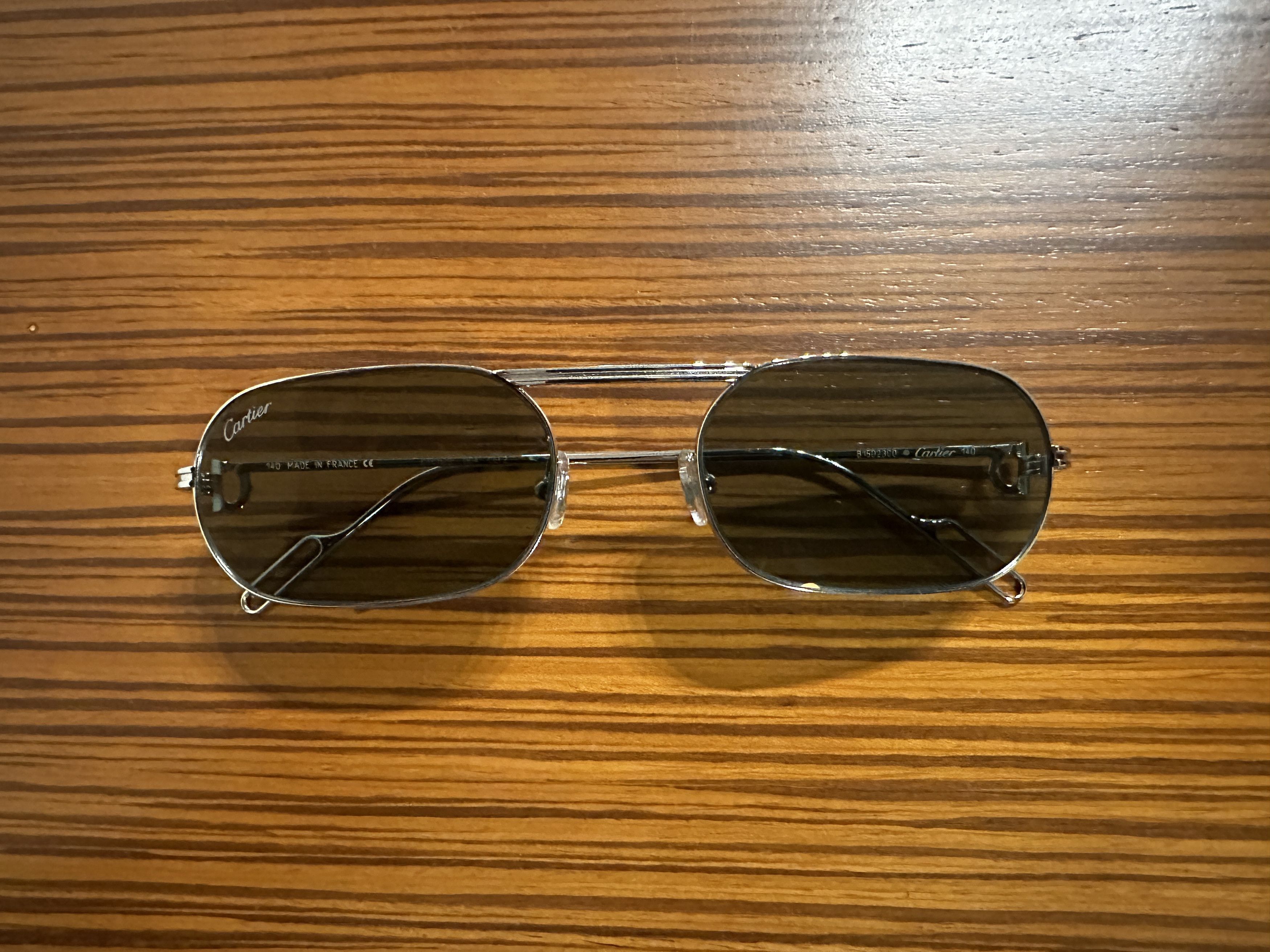 image of Cartier Oval Frame Platinum Sunglasses in Silver, Men's