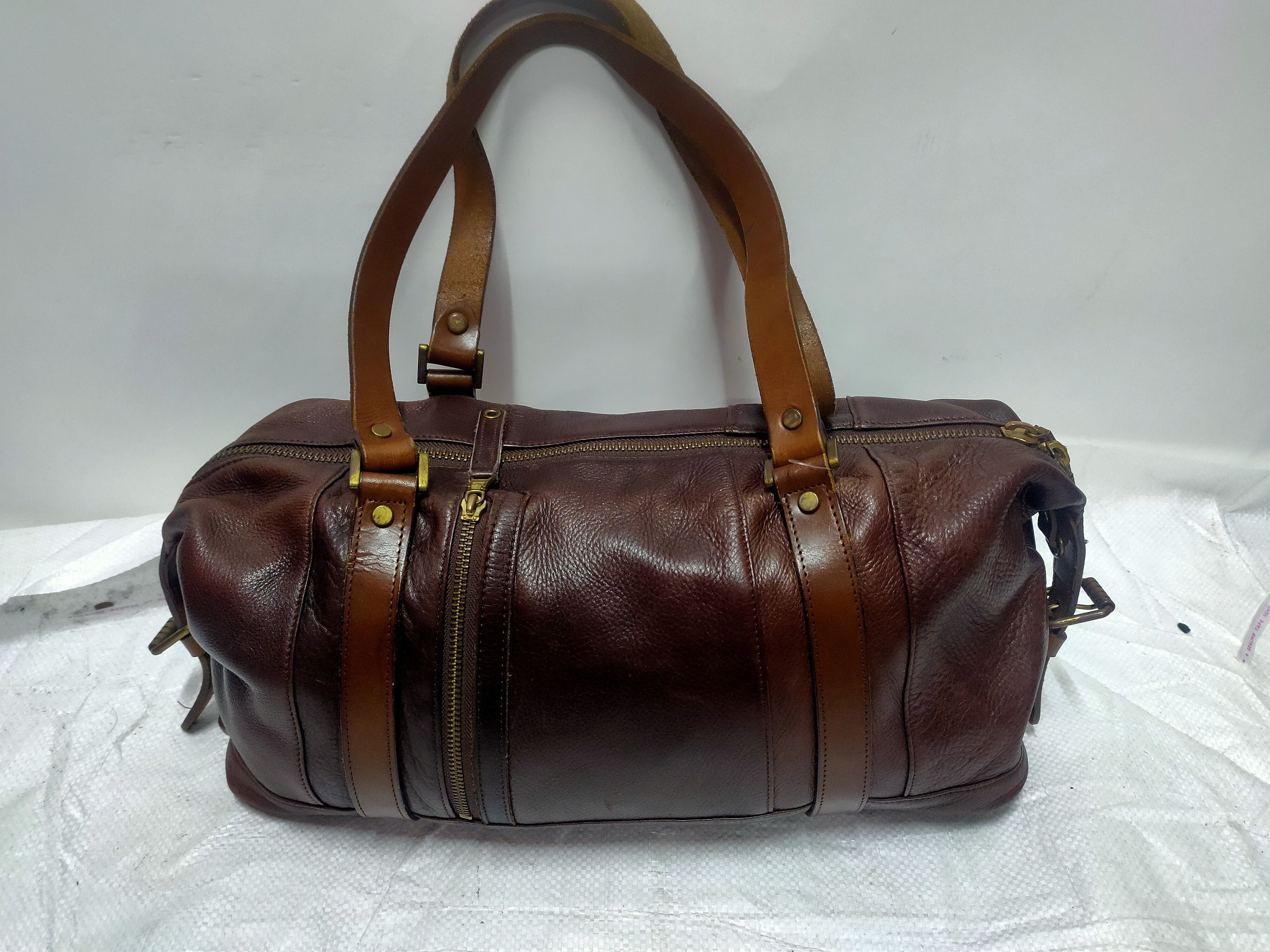 image of Masterpiece Leather Duffle Hand Bag in Browns, Men's