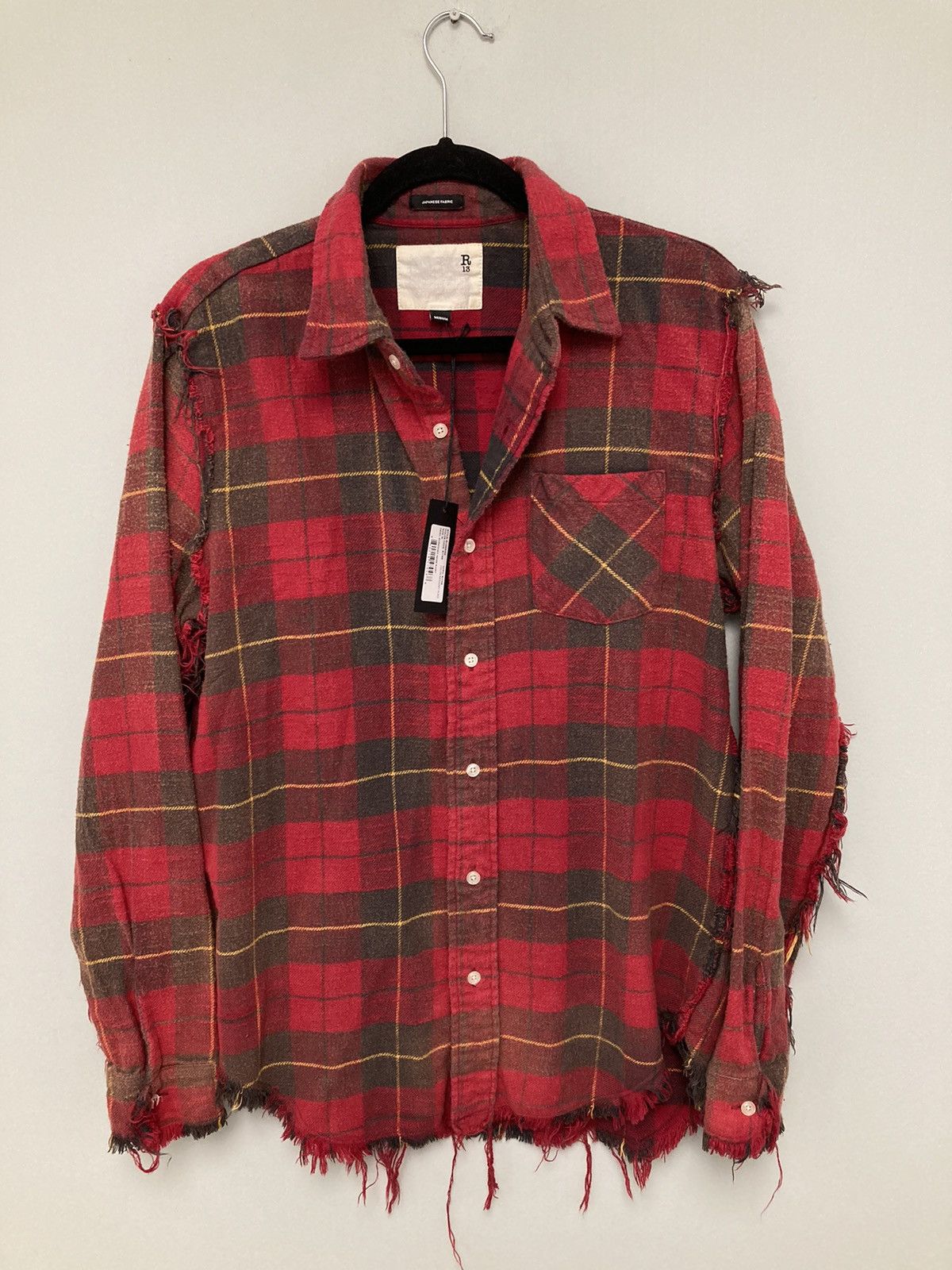 Shredded seam shirt. Medium