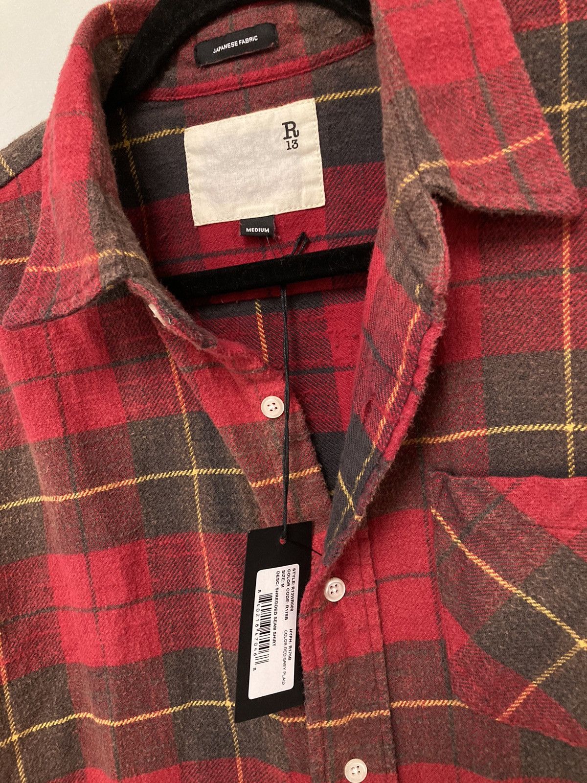 Shredded seam shirt. Medium