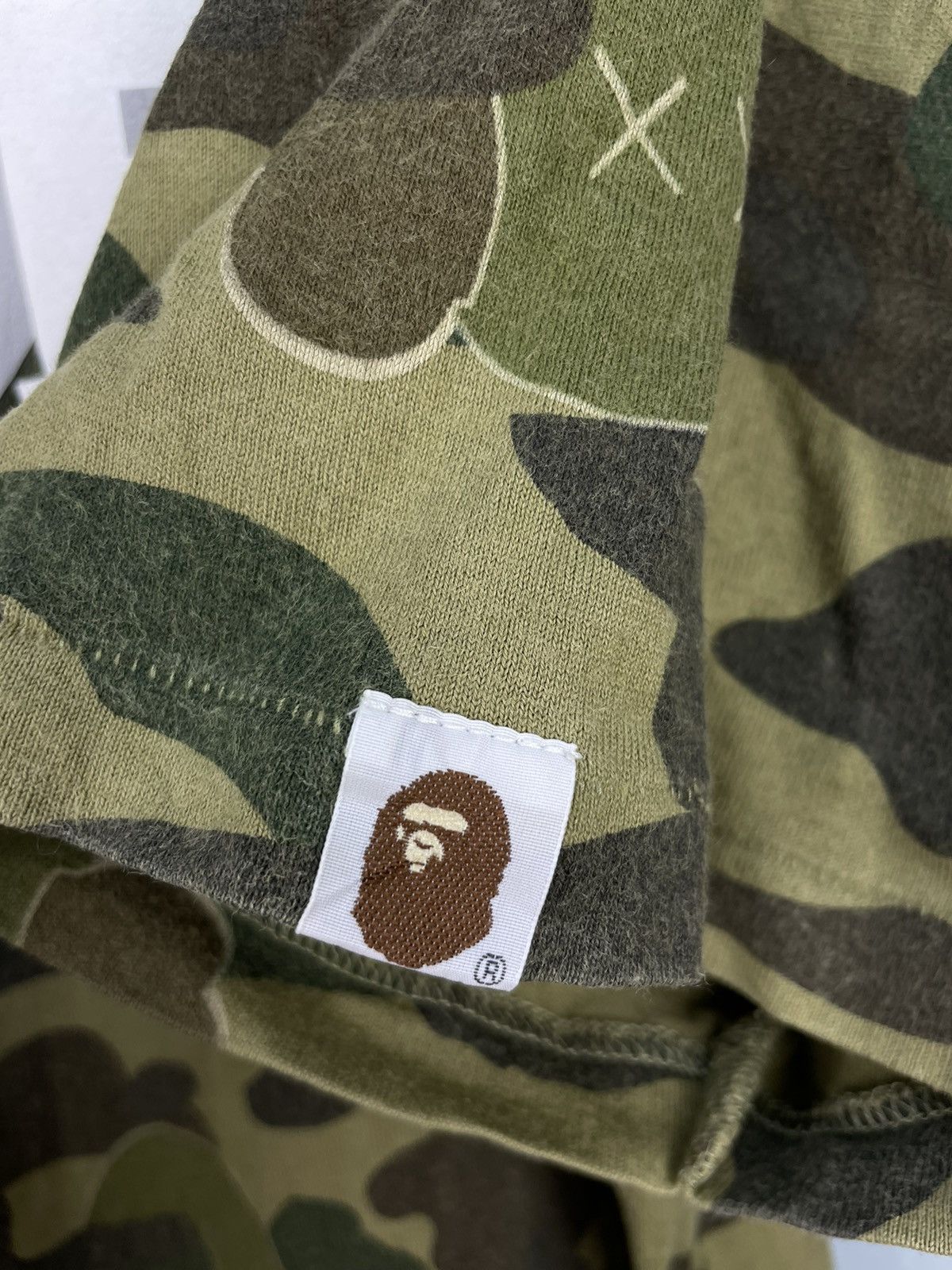 Bape × Kaws Bape x Kaws College Bendy Camo Tee Size US L / EU 52-54 / 3 - 6 Thumbnail