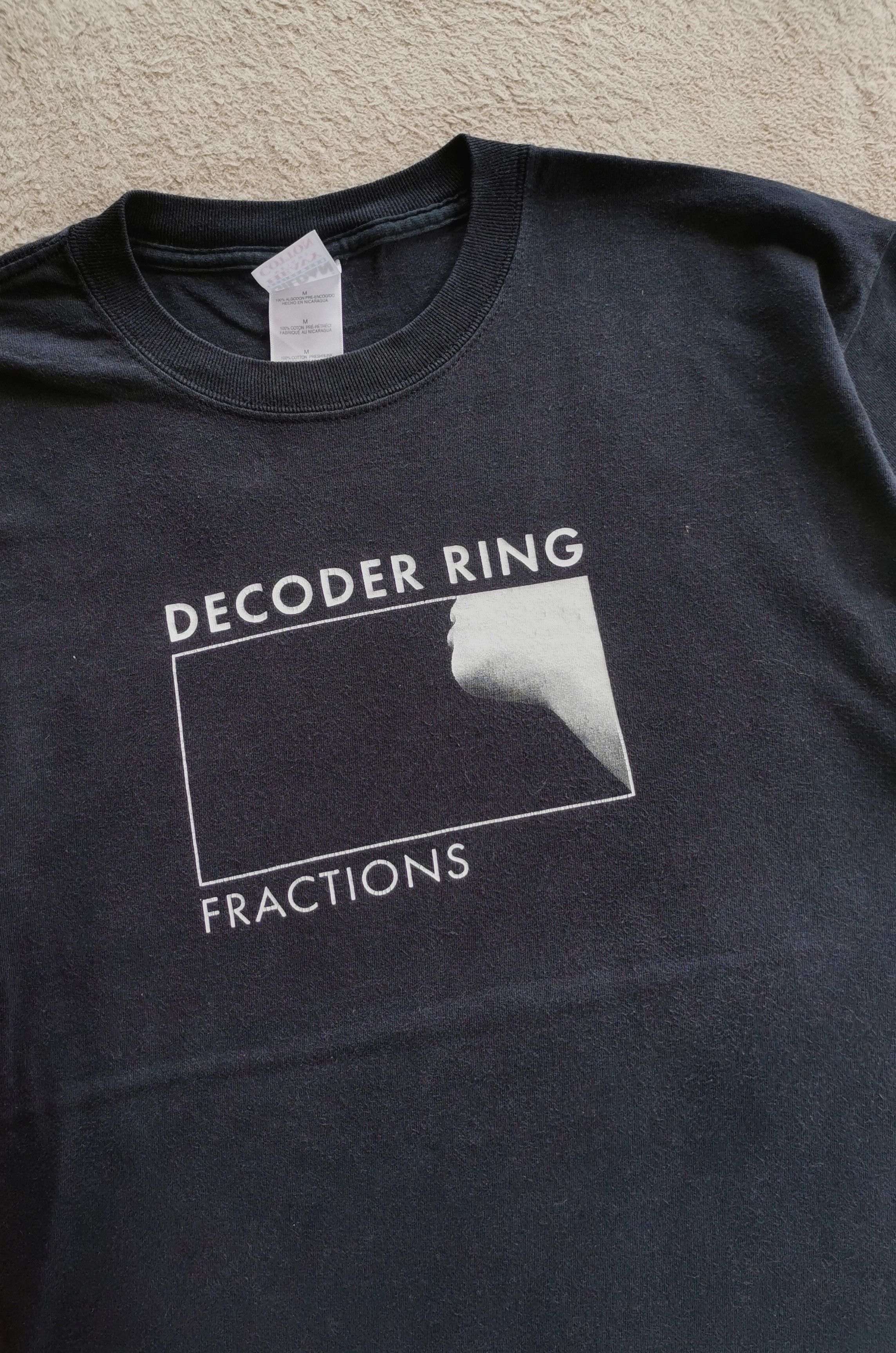 image of Archival Clothing x Band Tees 2005 Vintage Decoder Ring Band Fractions Album Shirt in Black (Size M