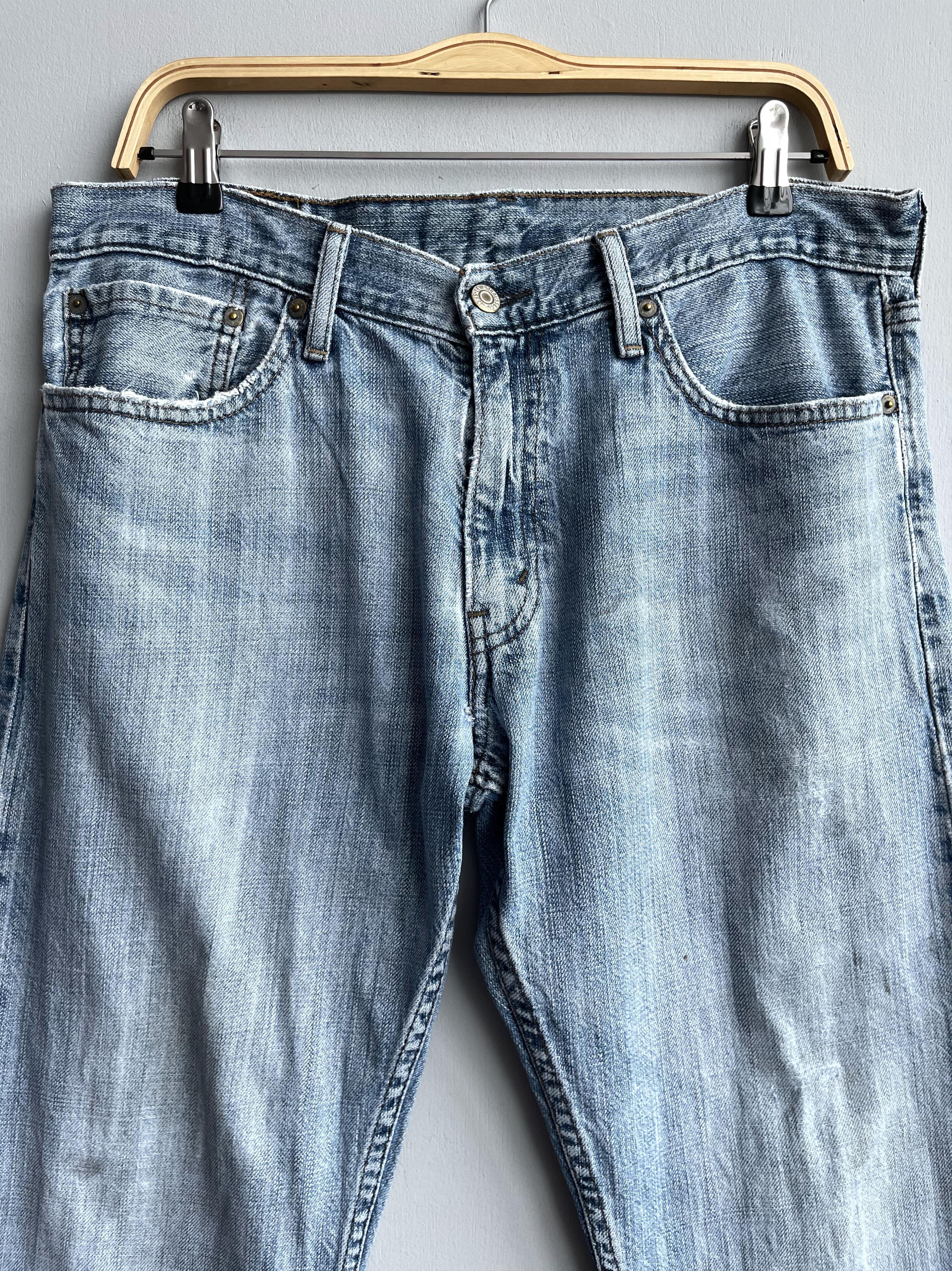 W35 L29 Vintage Levis 514 Distressed Dirty Ripped Jeans