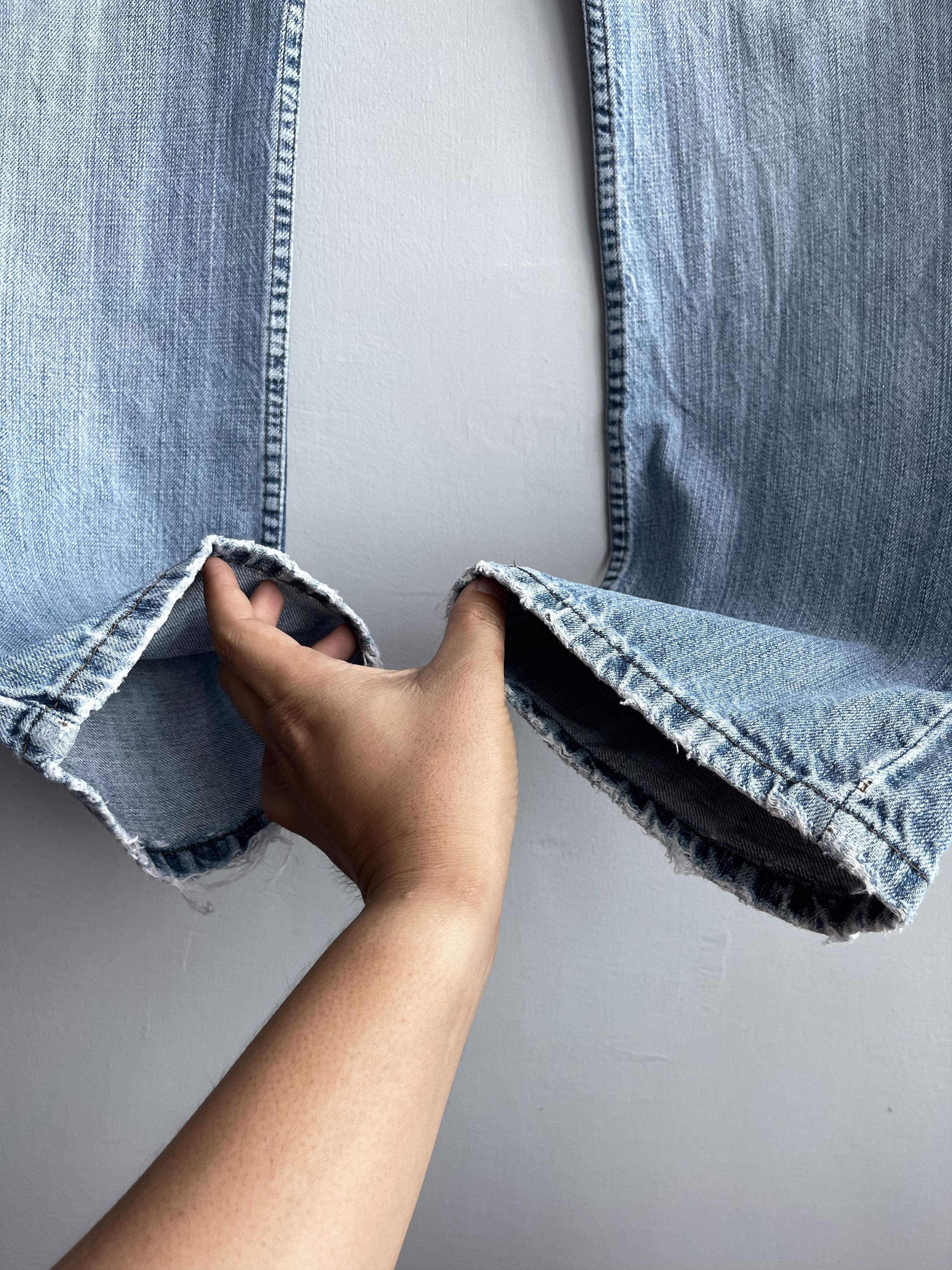 W35 L29 Vintage Levis 514 Distressed Dirty Ripped Jeans