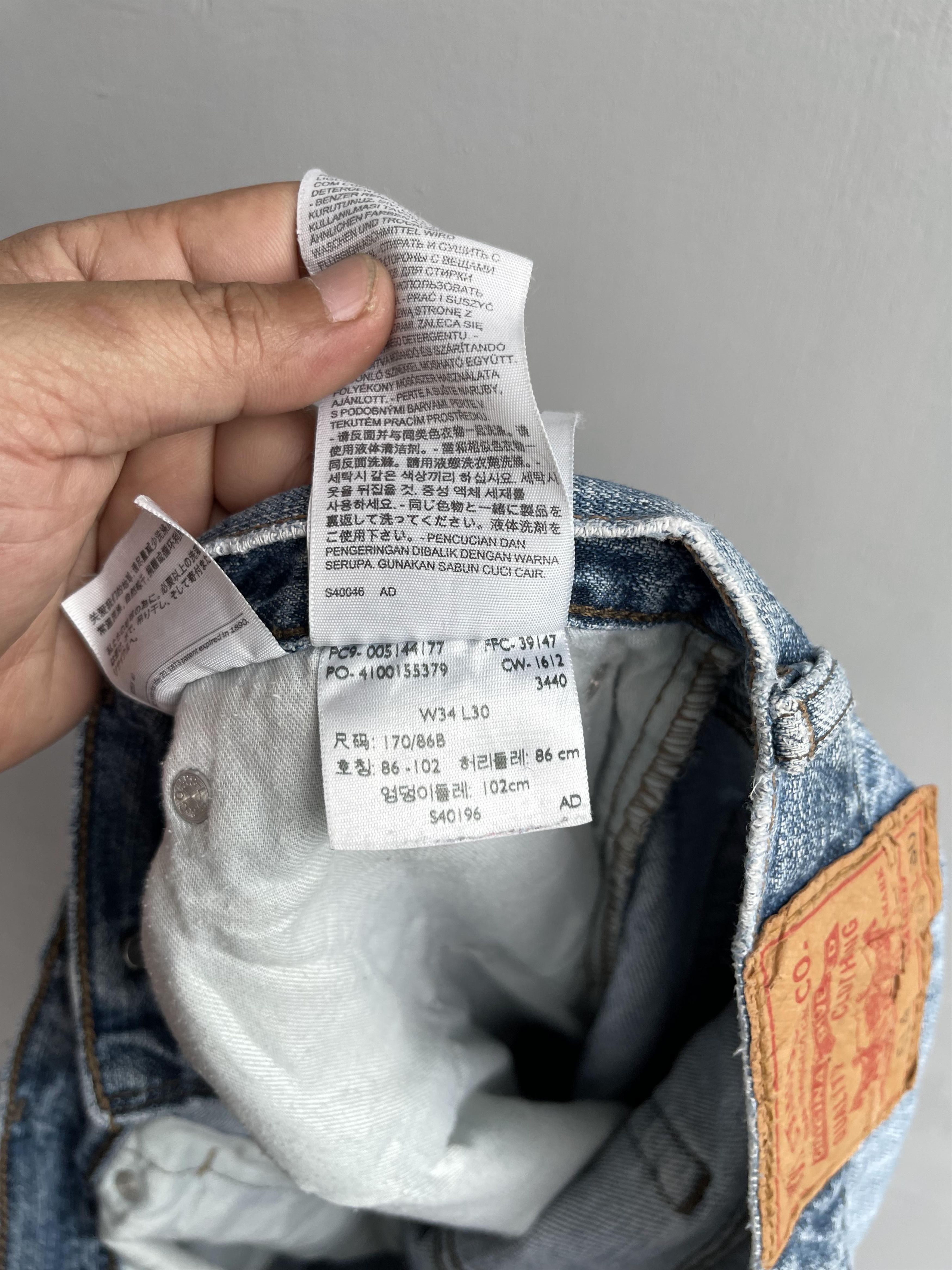 W35 L29 Vintage Levis 514 Distressed Dirty Ripped Jeans