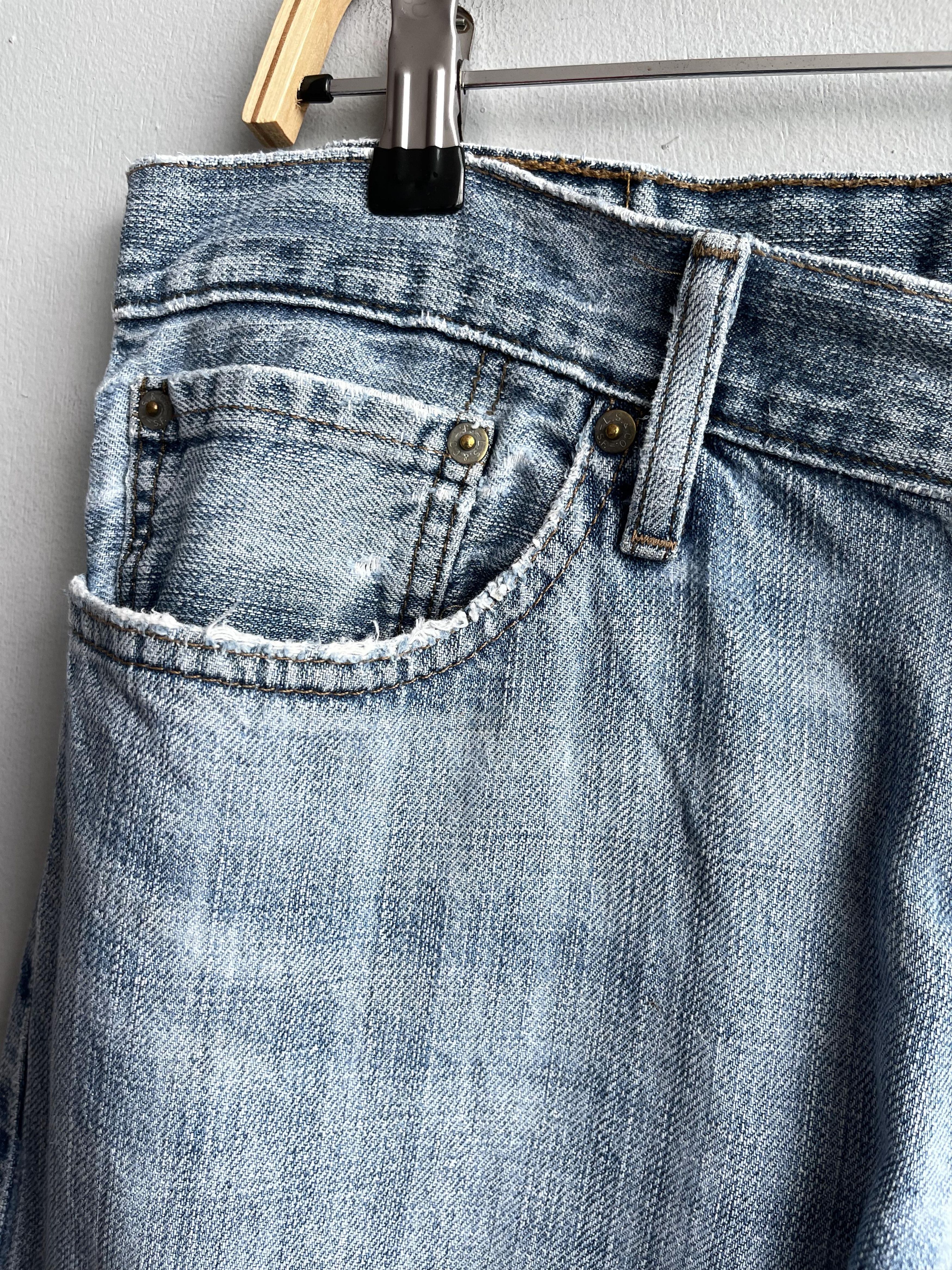 W35 L29 Vintage Levis 514 Distressed Dirty Ripped Jeans
