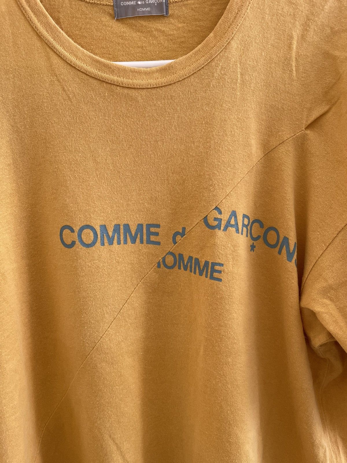 Comme des Garcons AD1997 Diagonal Stitch Logo Tee | Grailed