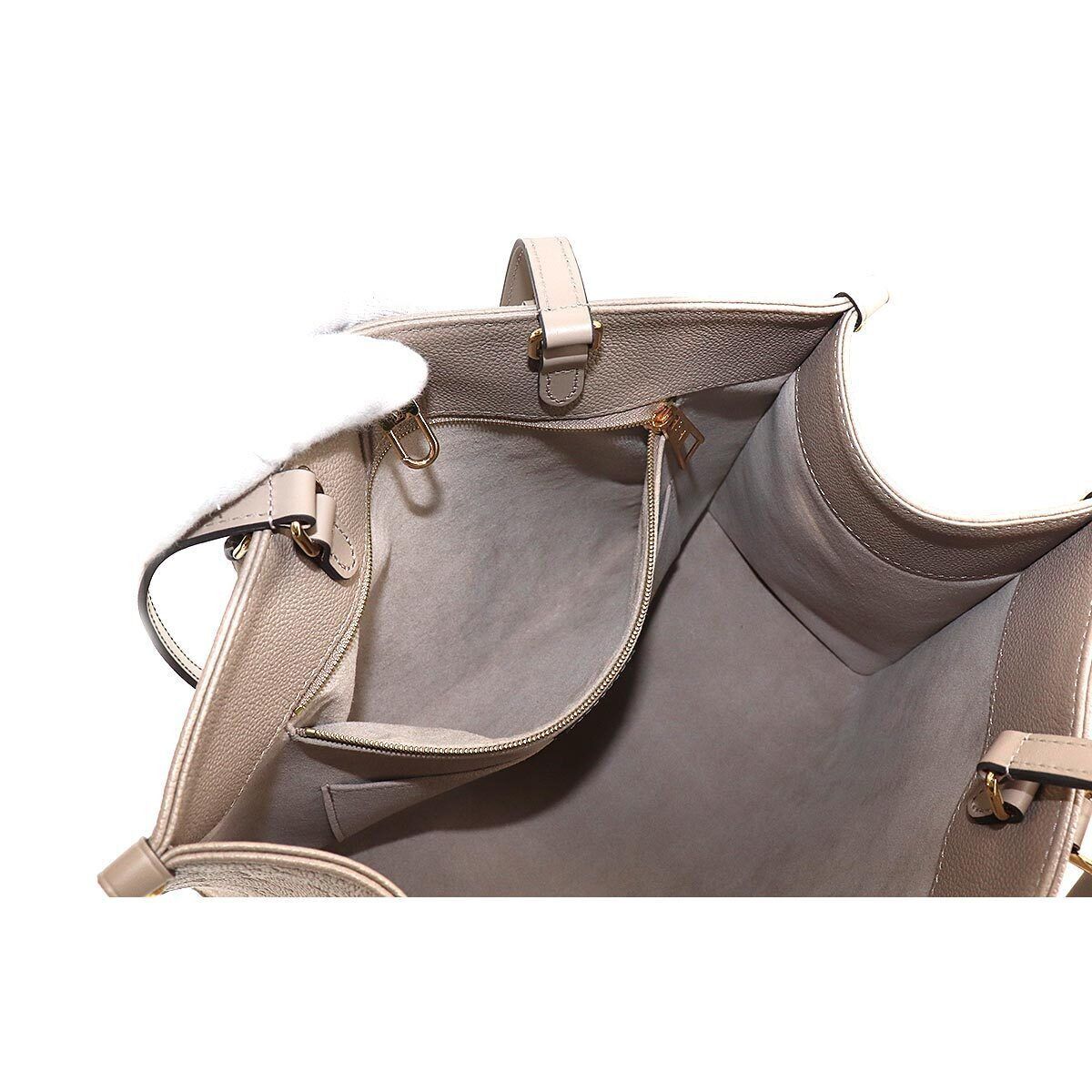 LOUIS VUITTON Monogram Empreinte On The Go MM Tote Shoulder Bag