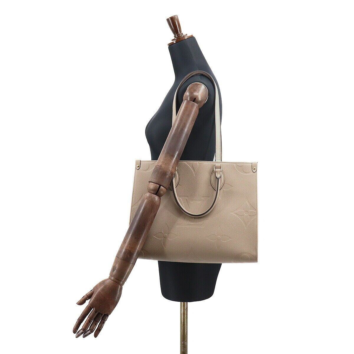 LOUIS VUITTON Monogram Empreinte On The Go MM Tote Shoulder Bag