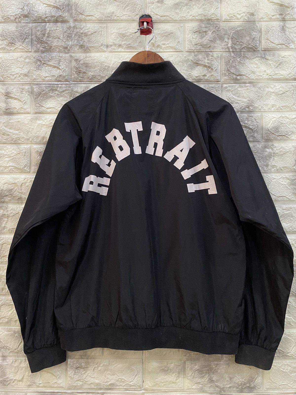 Rebtrait black varsity jacket