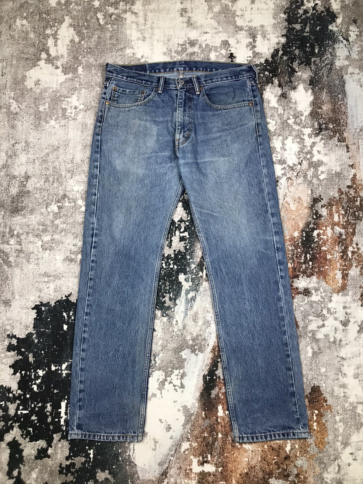 image of Vintage Levis 505 Blue Distressed Denim Jeans, Men's (Size 35)