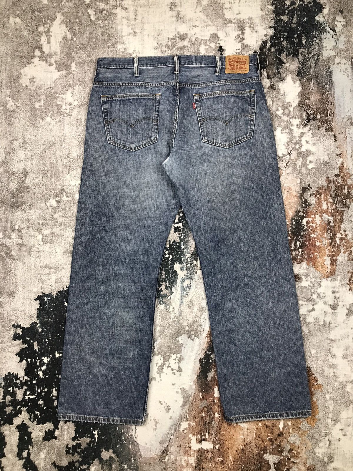 Vintage Levis 569 Light Wash Distressed Denim Jeans