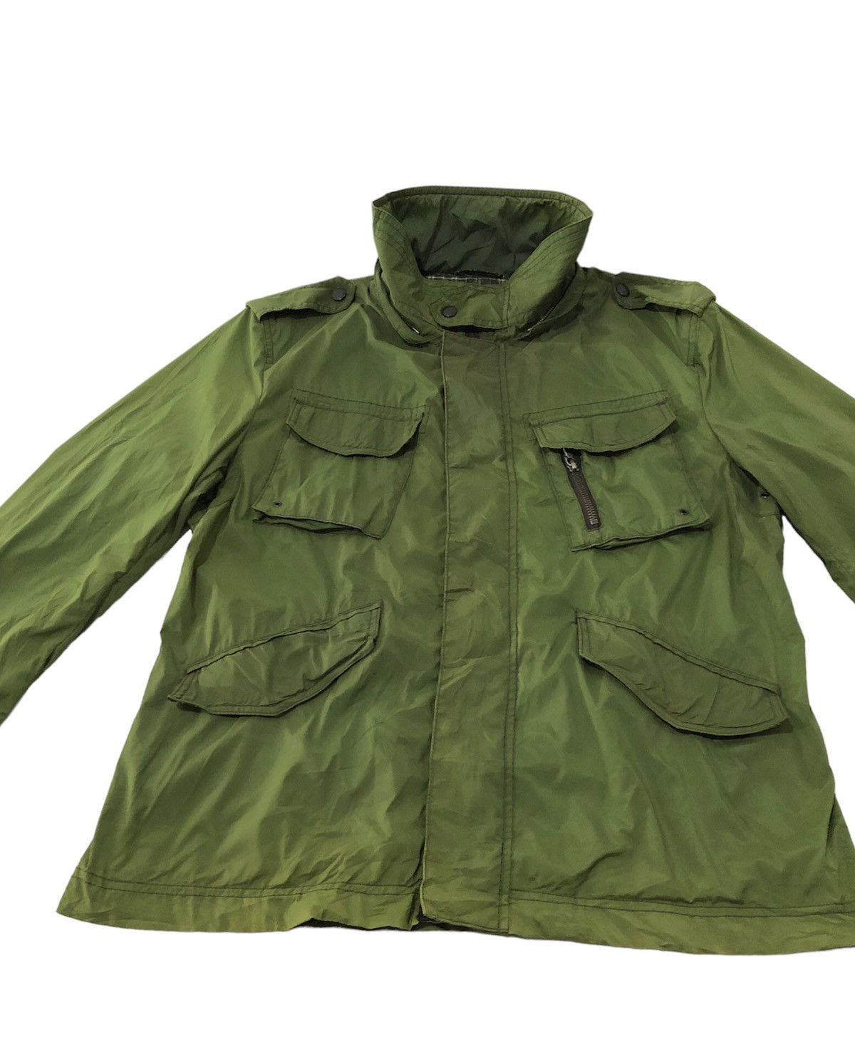 Burberry black label nylon zipped up jacket.