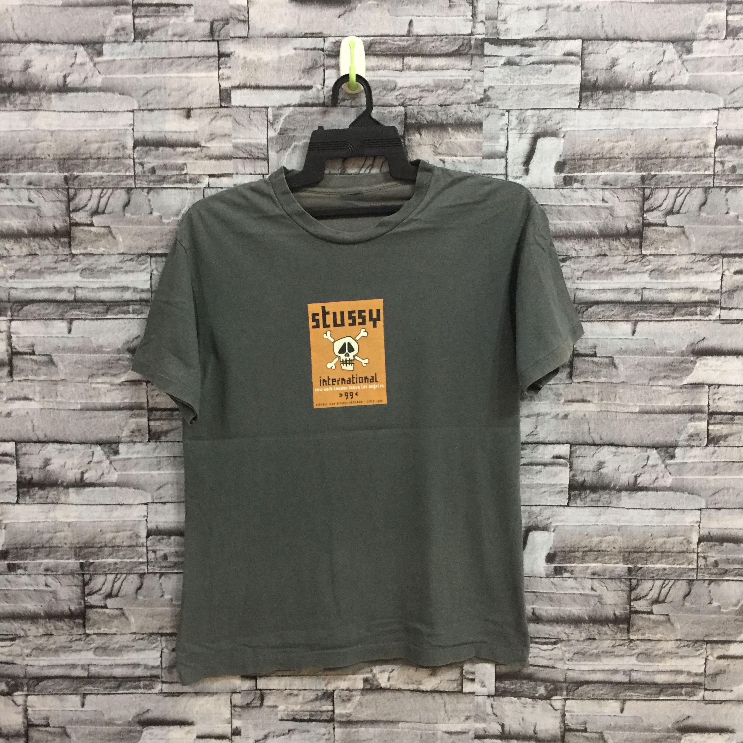 トップス STUSSY PORTISHEAD DUMMY TEE Unified Goods