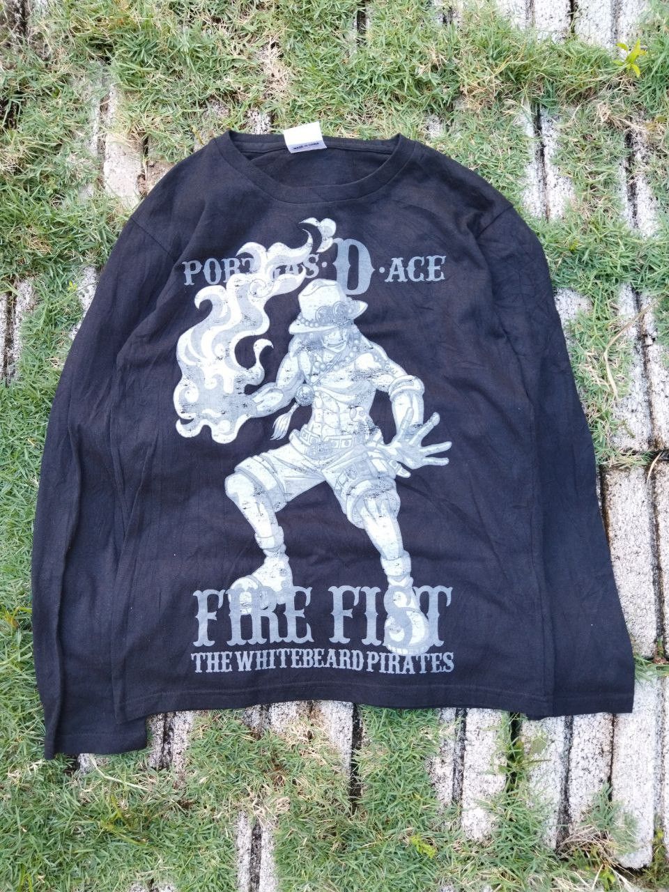 image of Anima x One Piece Vintage One Piece Portgas D Ace T-Shirt in Black, Men's (Size Medium)