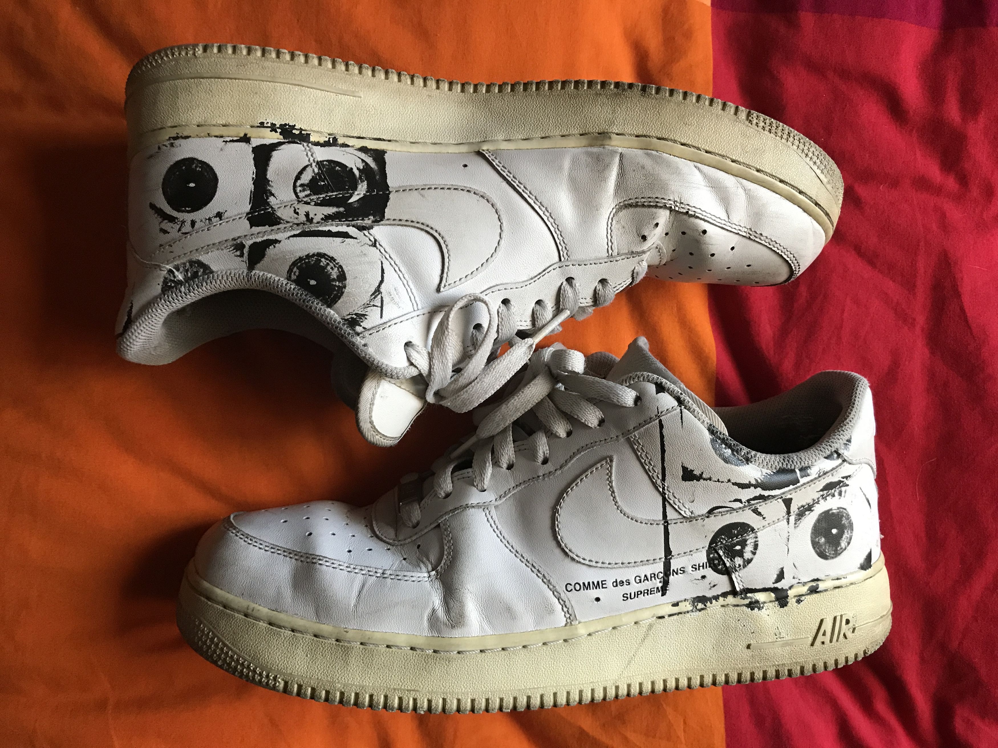 Comme des garçons x supreme x air force 1 low 'eyes' best sale