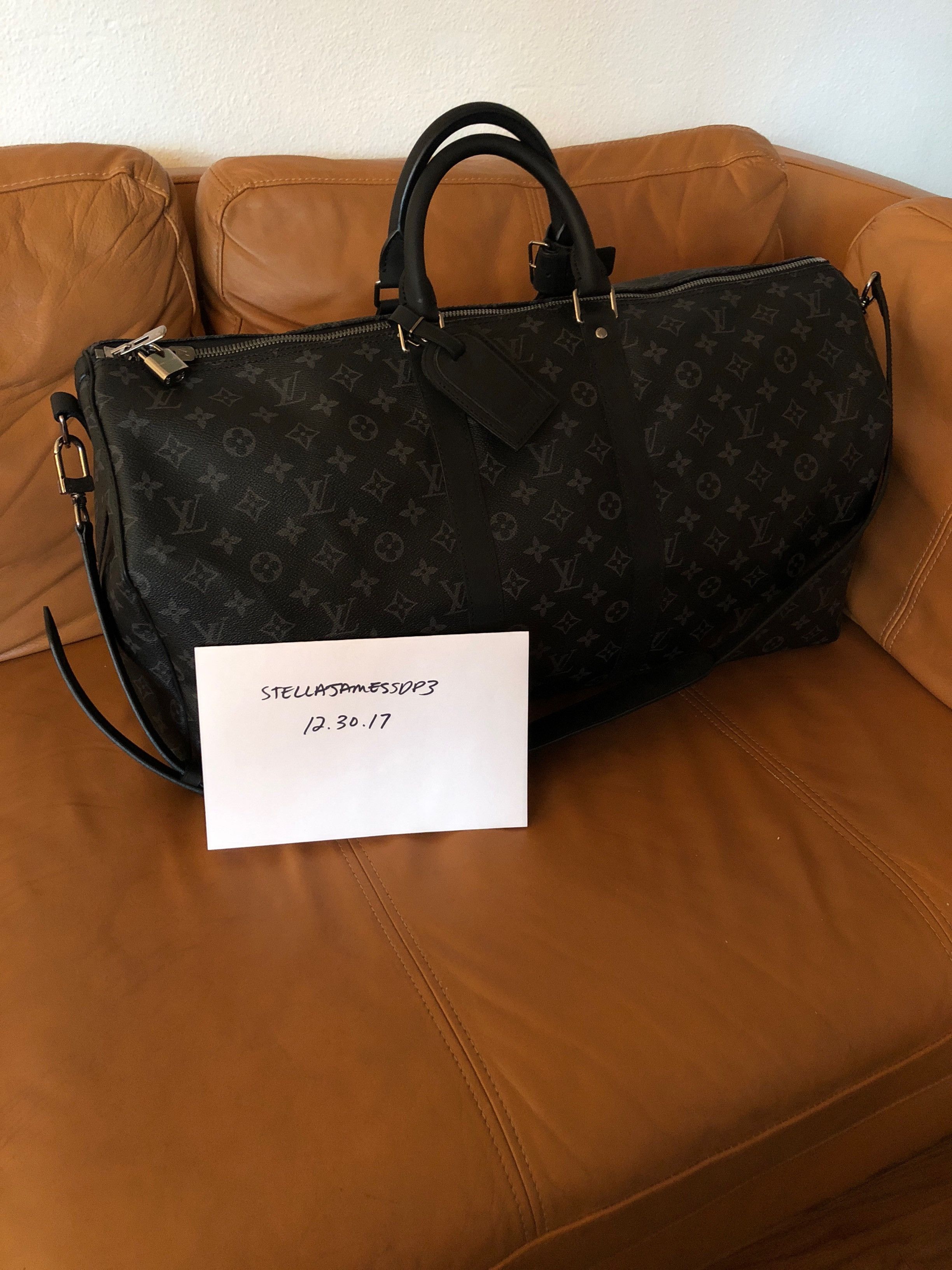 Shop Louis Vuitton Keepall Keepall Bandoulière 55 (M40605) by Ravie