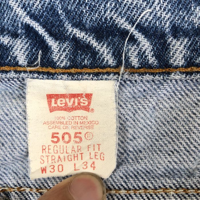 Vintage Vintage Orange Tab Levi's 505 Distressed Light Wash Jeans | Grailed