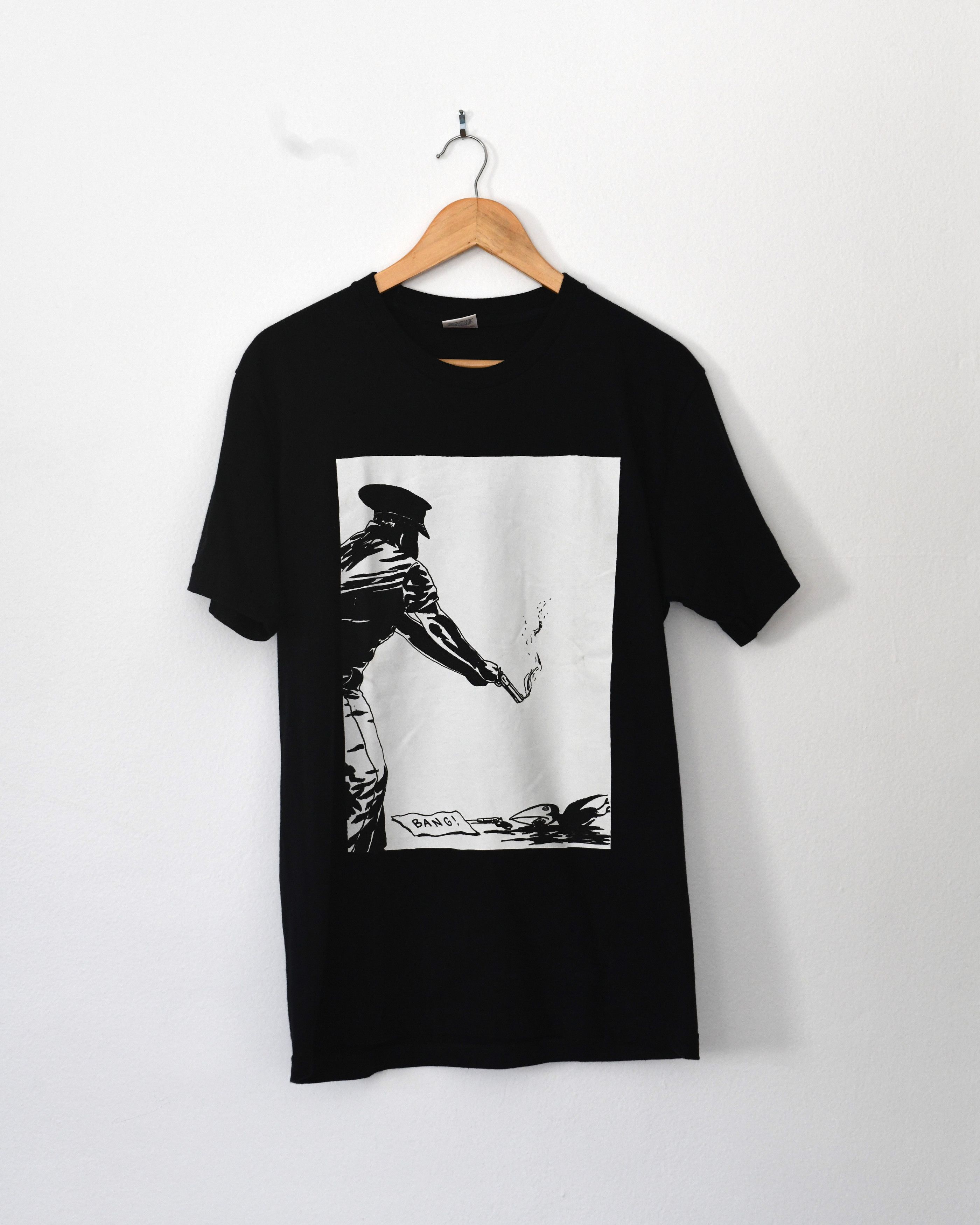 Supreme Raymond Petition 'Bang' Police Shoot Bird Tee | Grailed