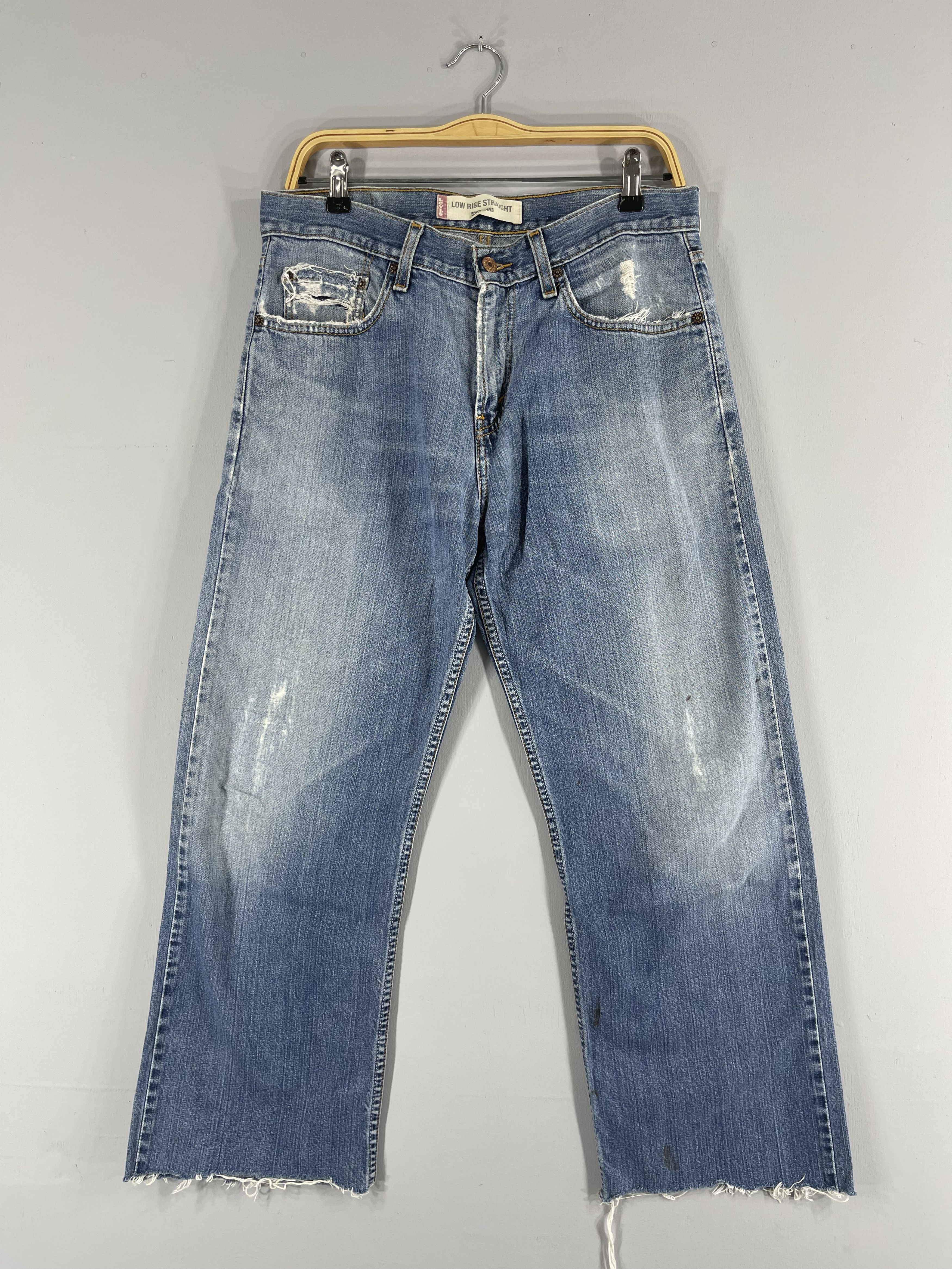 Levis 529 Distressed Light Wash Flare Leg Frayed Hem Jeans