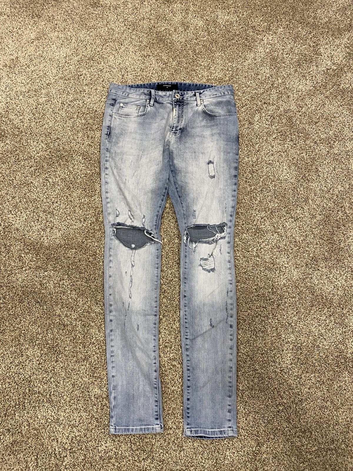 Represent indigo blowout denim
