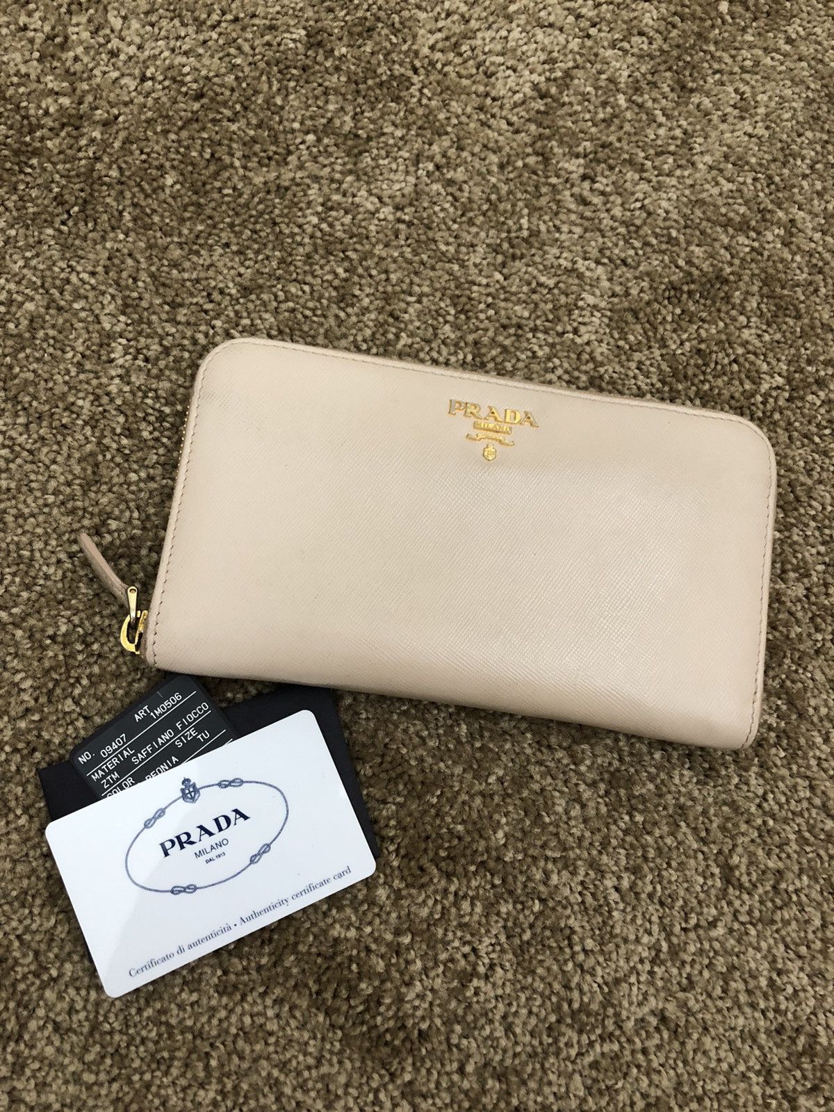 Prada saffiano metal leather zippy wallet