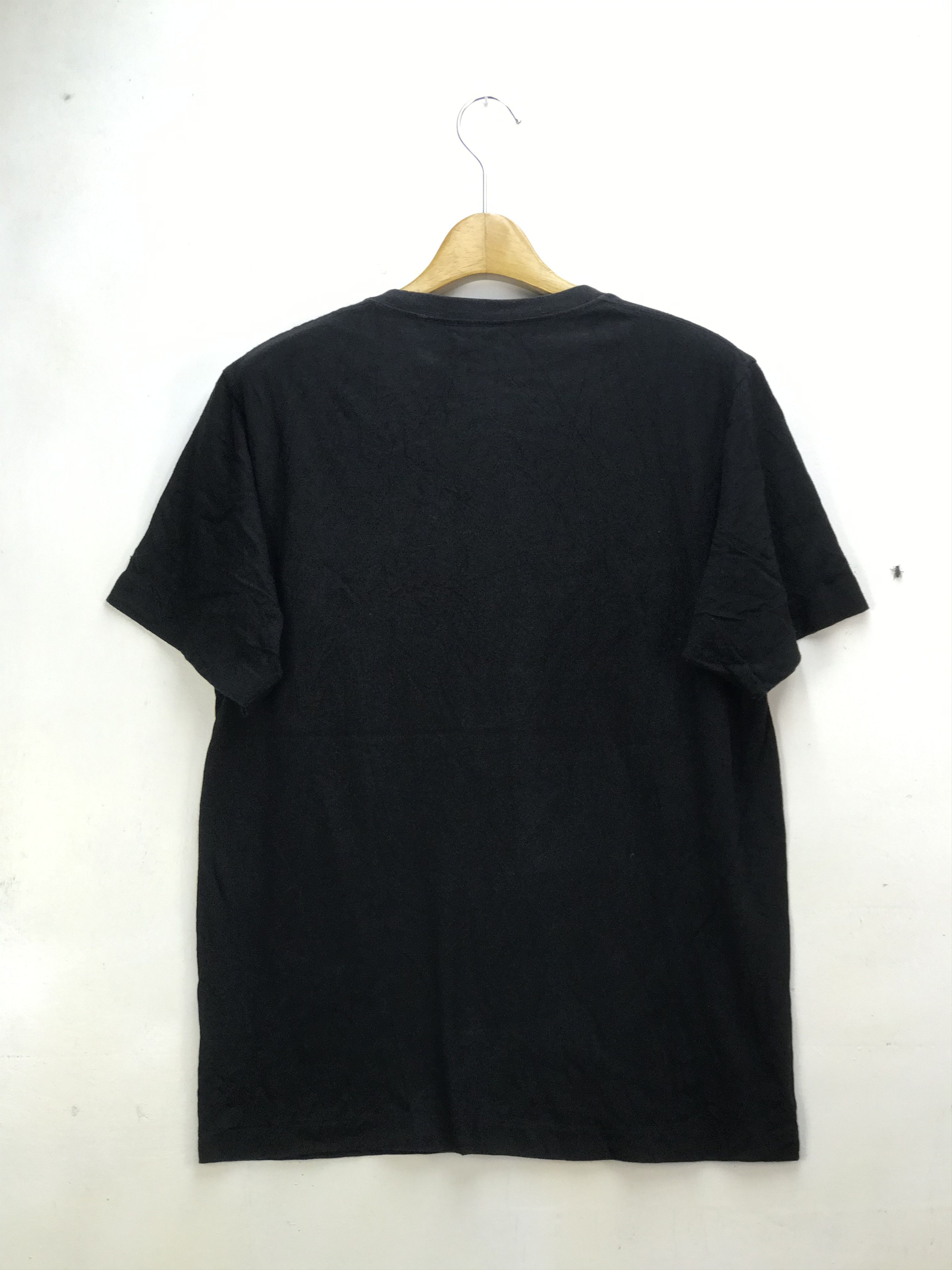 Kaws × Peanuts × Uniqlo KAWS X UNIQLO X PEANUTS SNOOPY SHIRT Size US L / EU 52-54 / 3 - 5 Thumbnail